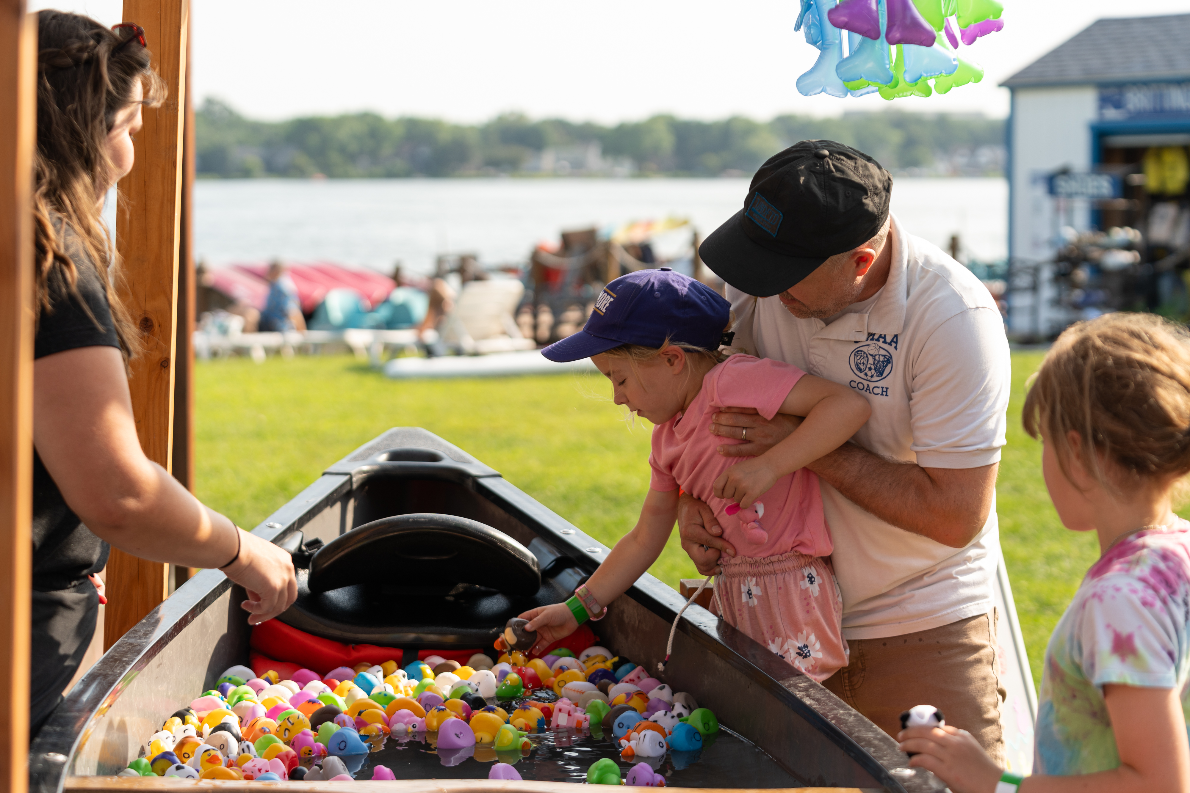 Crowds enjoying the ULI Fun Fair in downtown Madison with booths and games