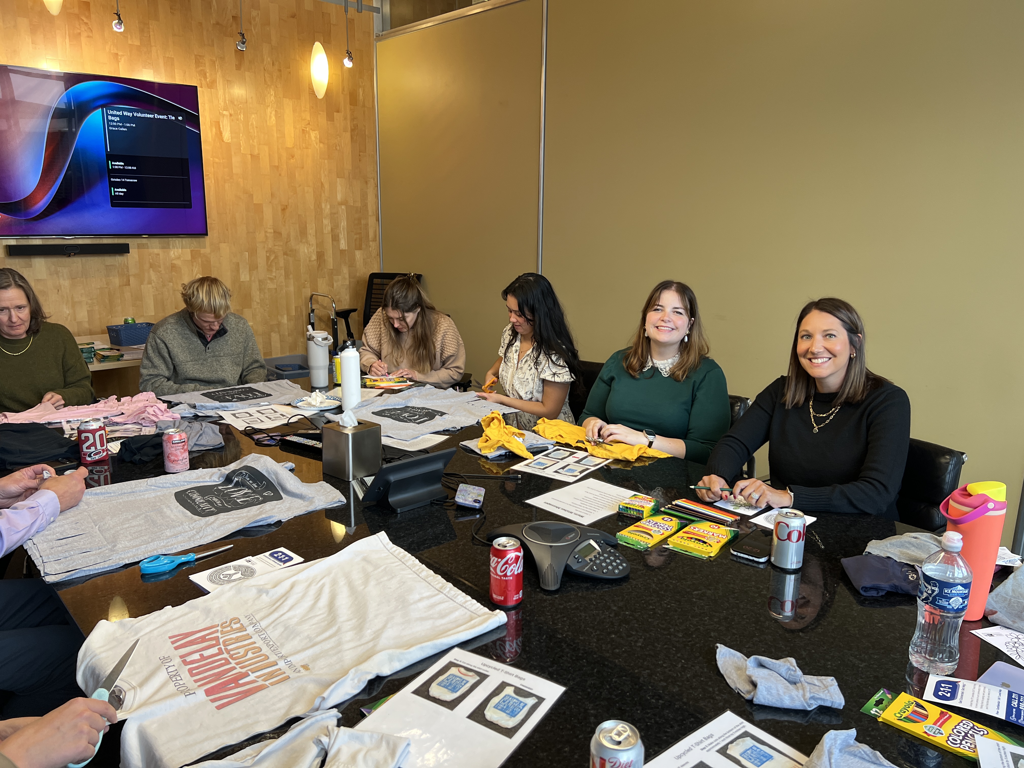 ULI employees getting creative making bag T-Shirts for the 2025 United Wat Campaign 