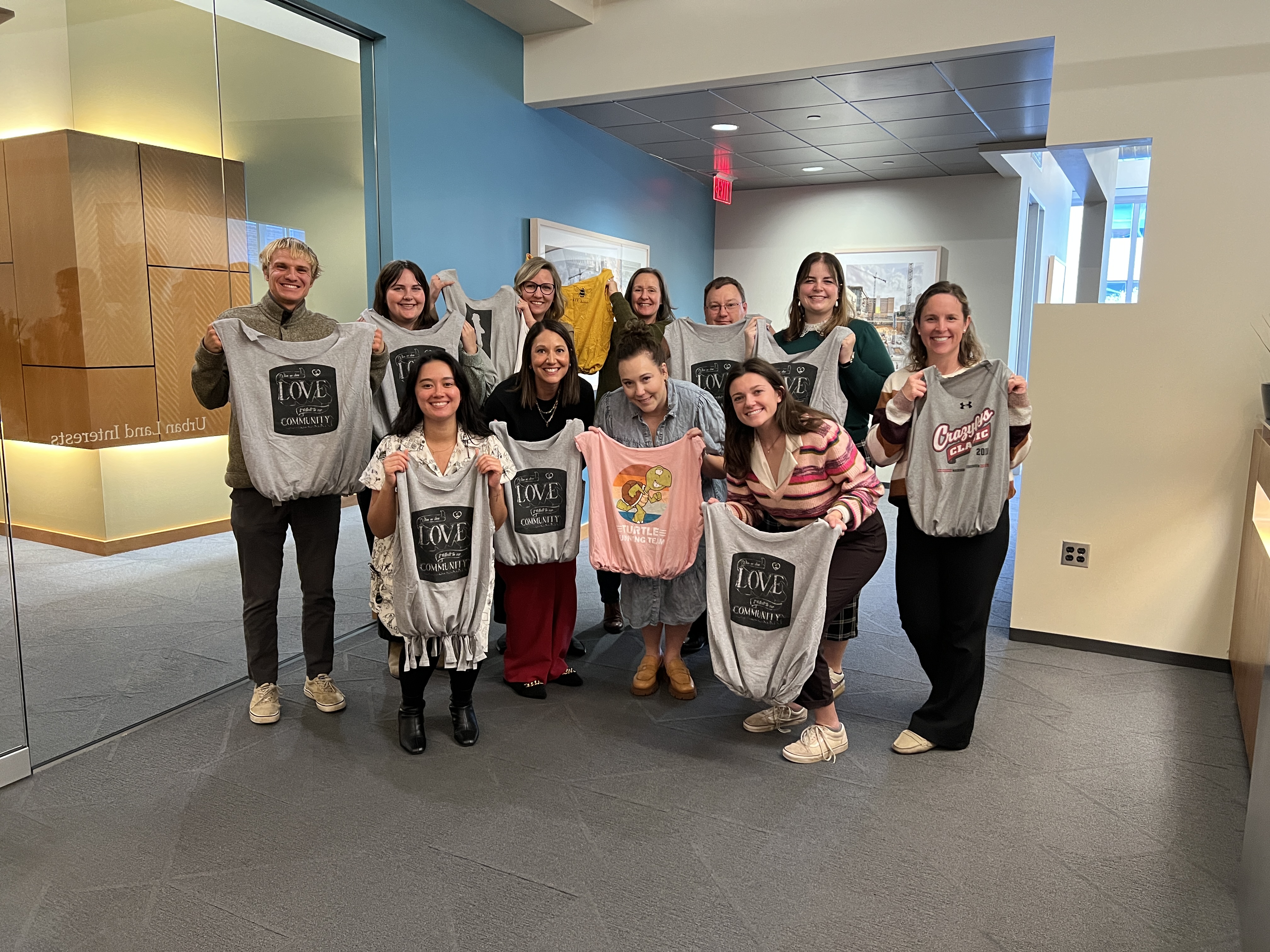 ULI employees getting creative making bag T-Shirts for the 2025 United Wat Campaign 