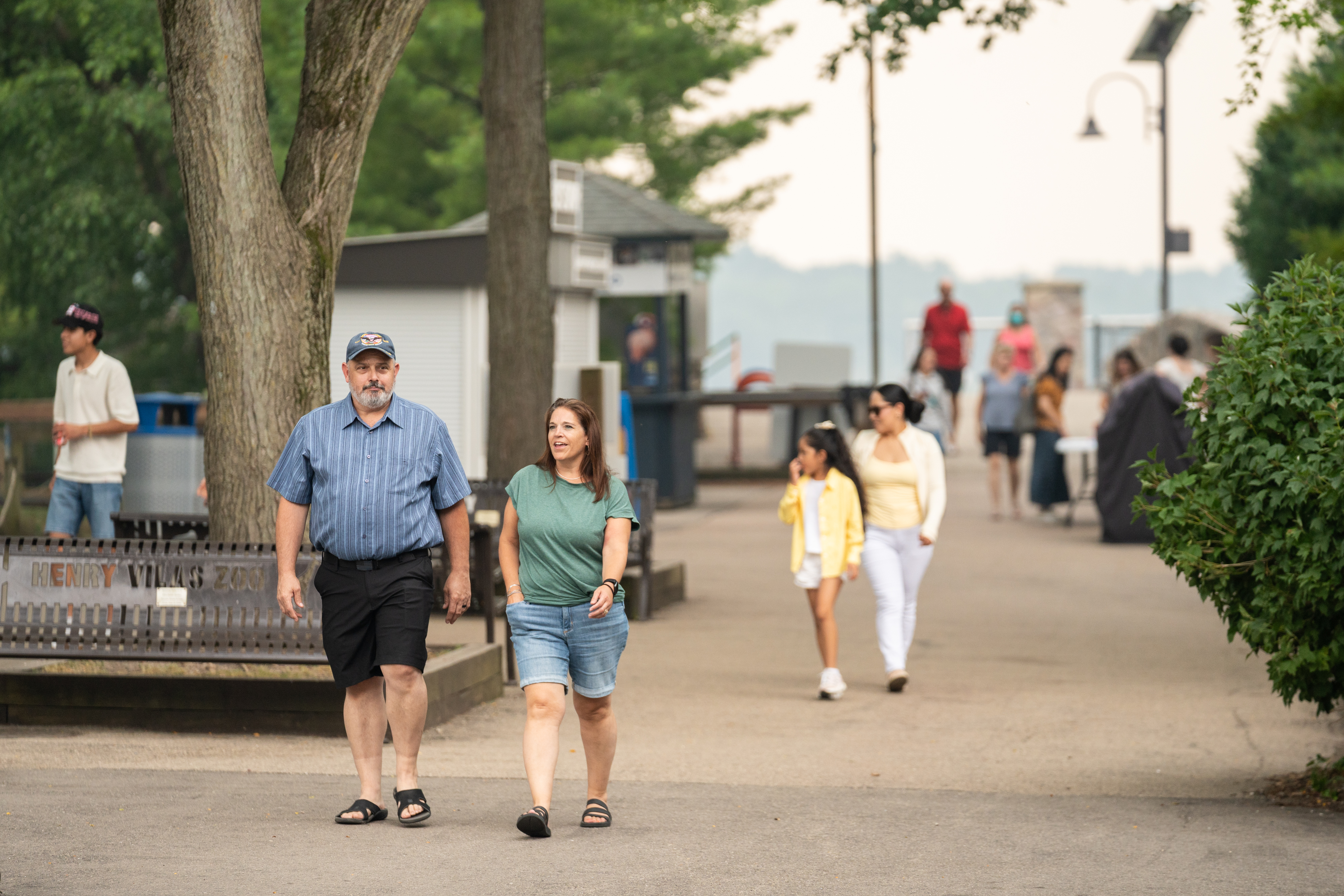 Urban Land Interests employees and their families walking through Henry Vilas Zoo during the annual company picnic in Madison