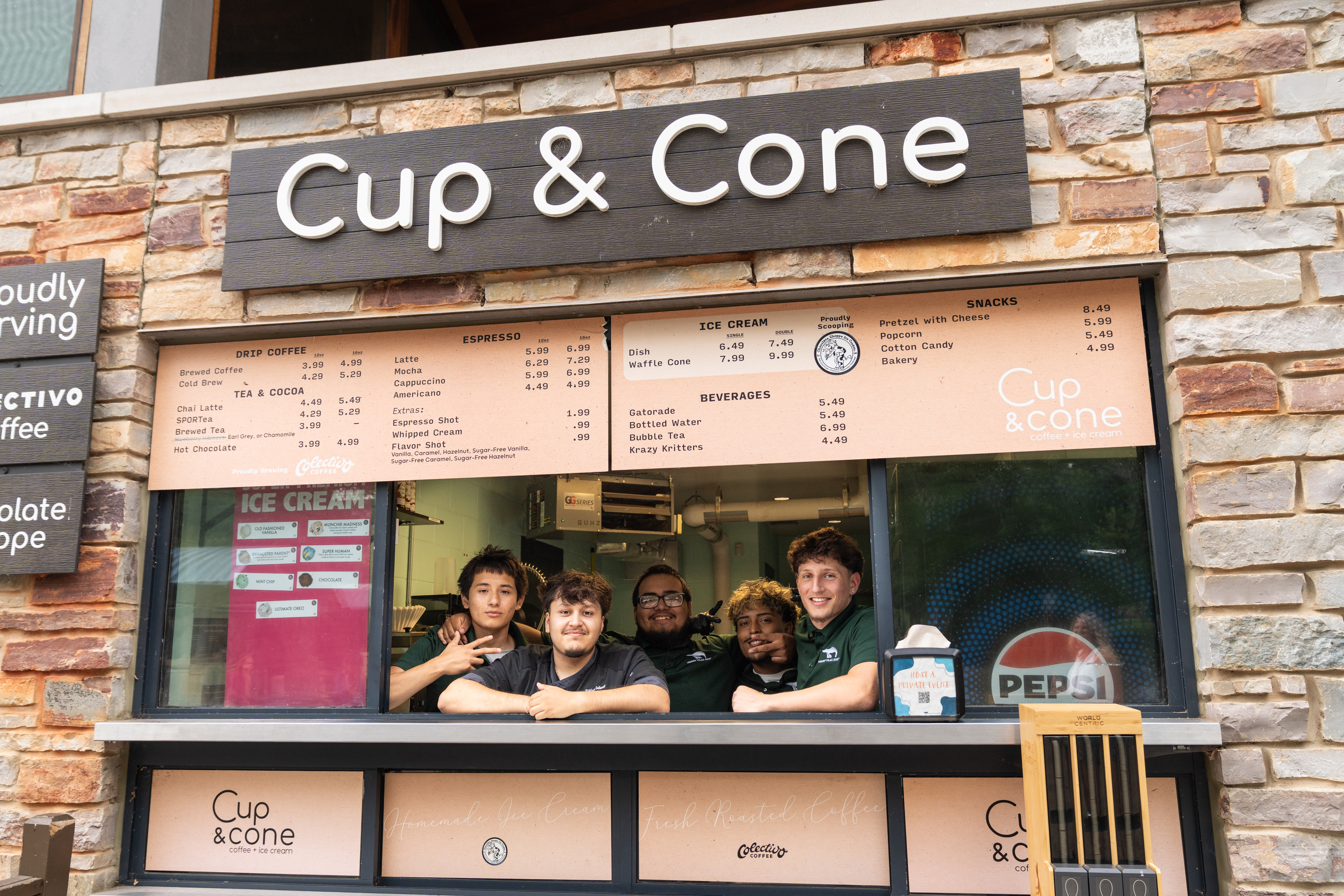 Cup & Cone employees serving guests during the Urban Land Interests company picnic at Henry Vilas Zoo
