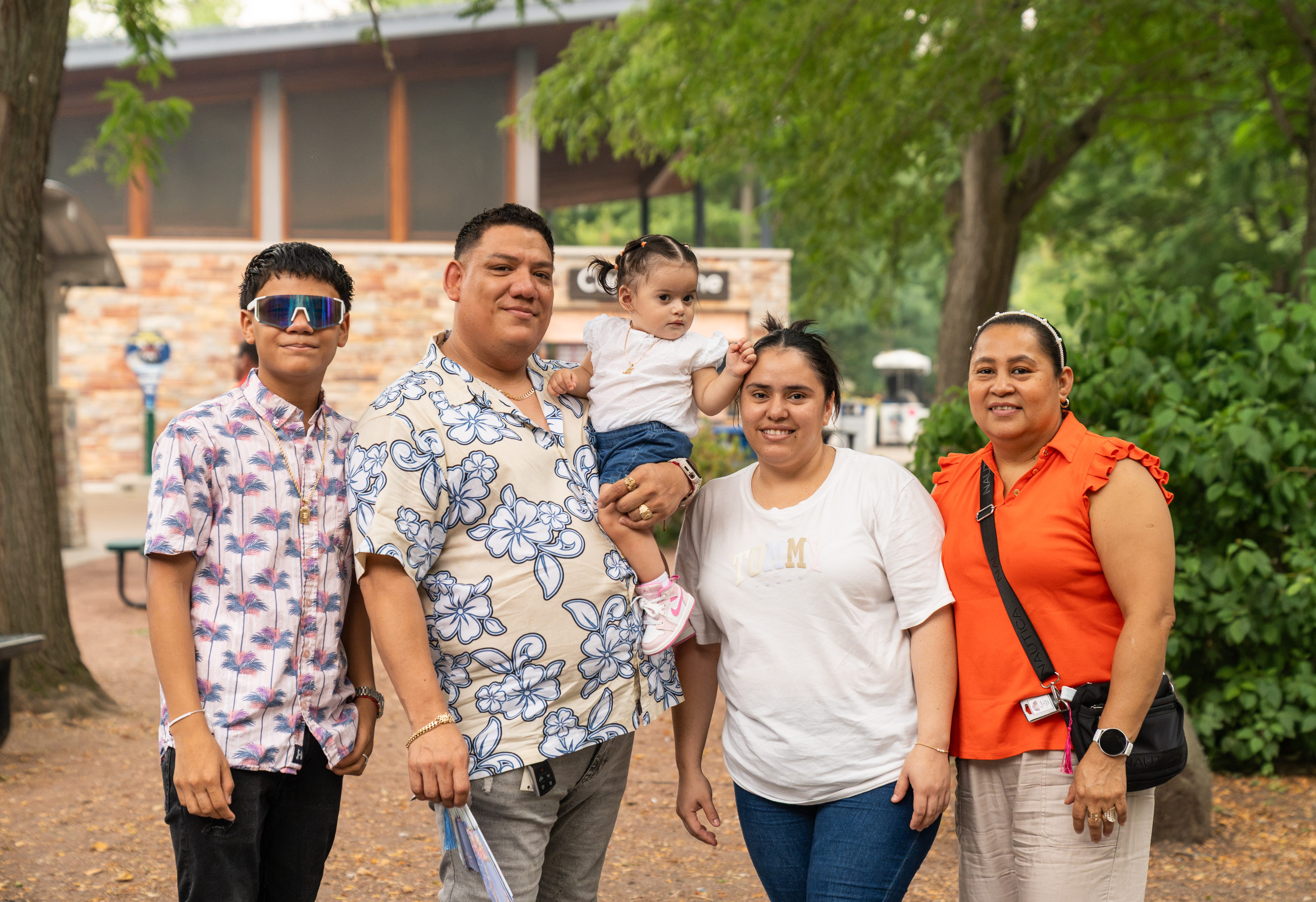 Urban Land Interests employees and their families posing for a photo during the annual company picnic at Henry Vilas Zoo