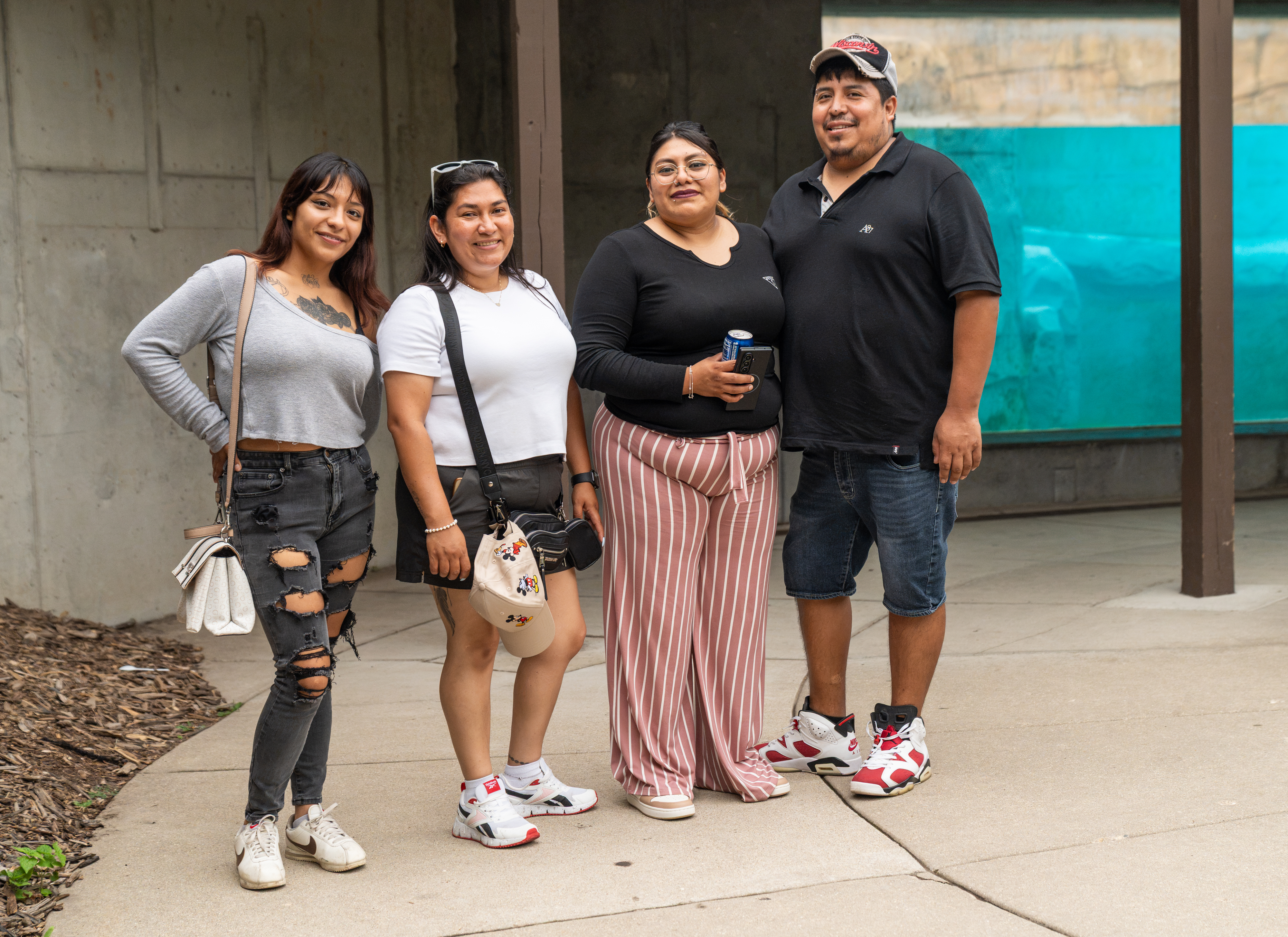 Urban Land Interests employees and their family members posing together during the annual company picnic at Henry Vilas Zoo