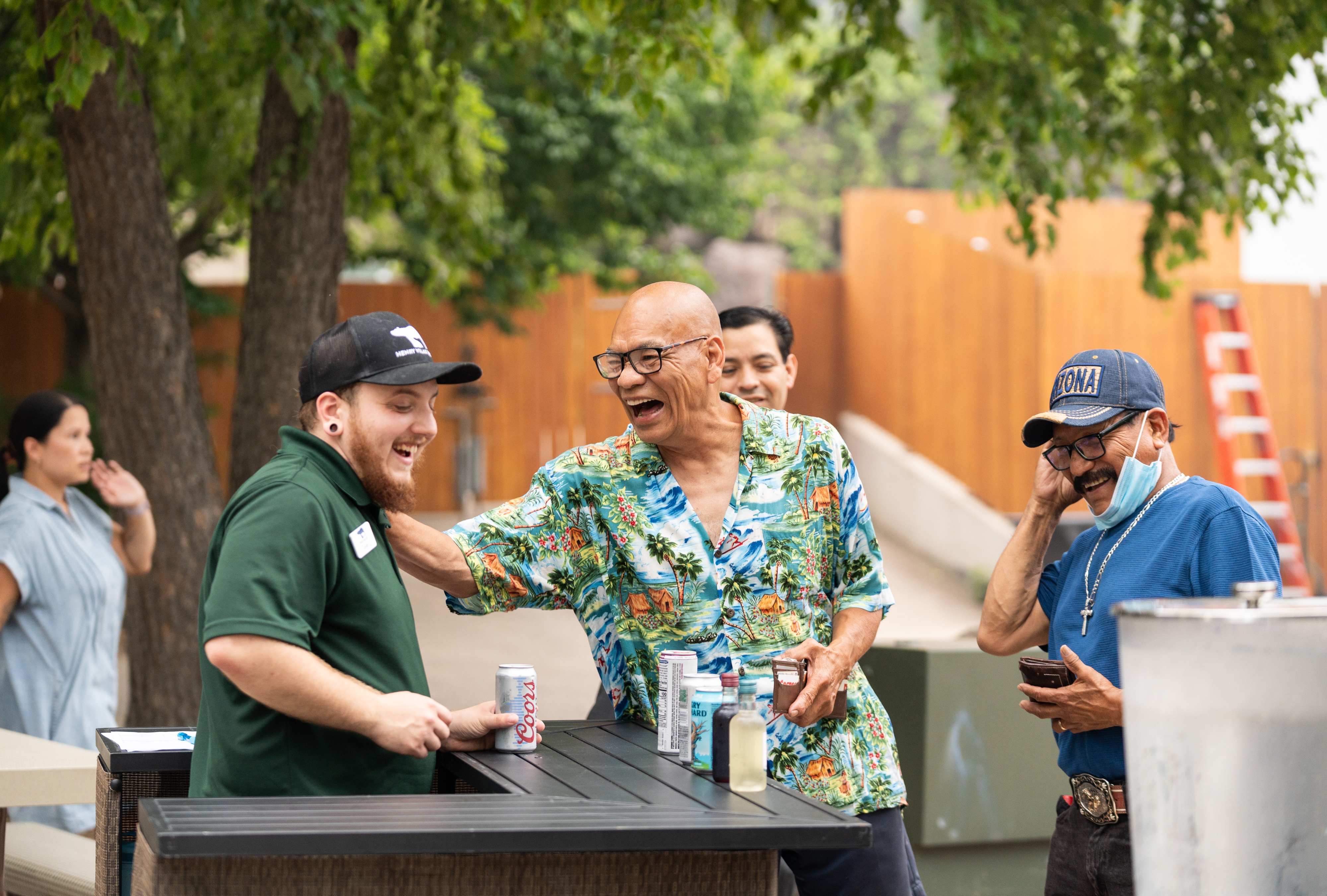 ULI employees and guests enjoying refreshments and spending time together during the annual company picnic at Henry Vilas Zoo in Madison