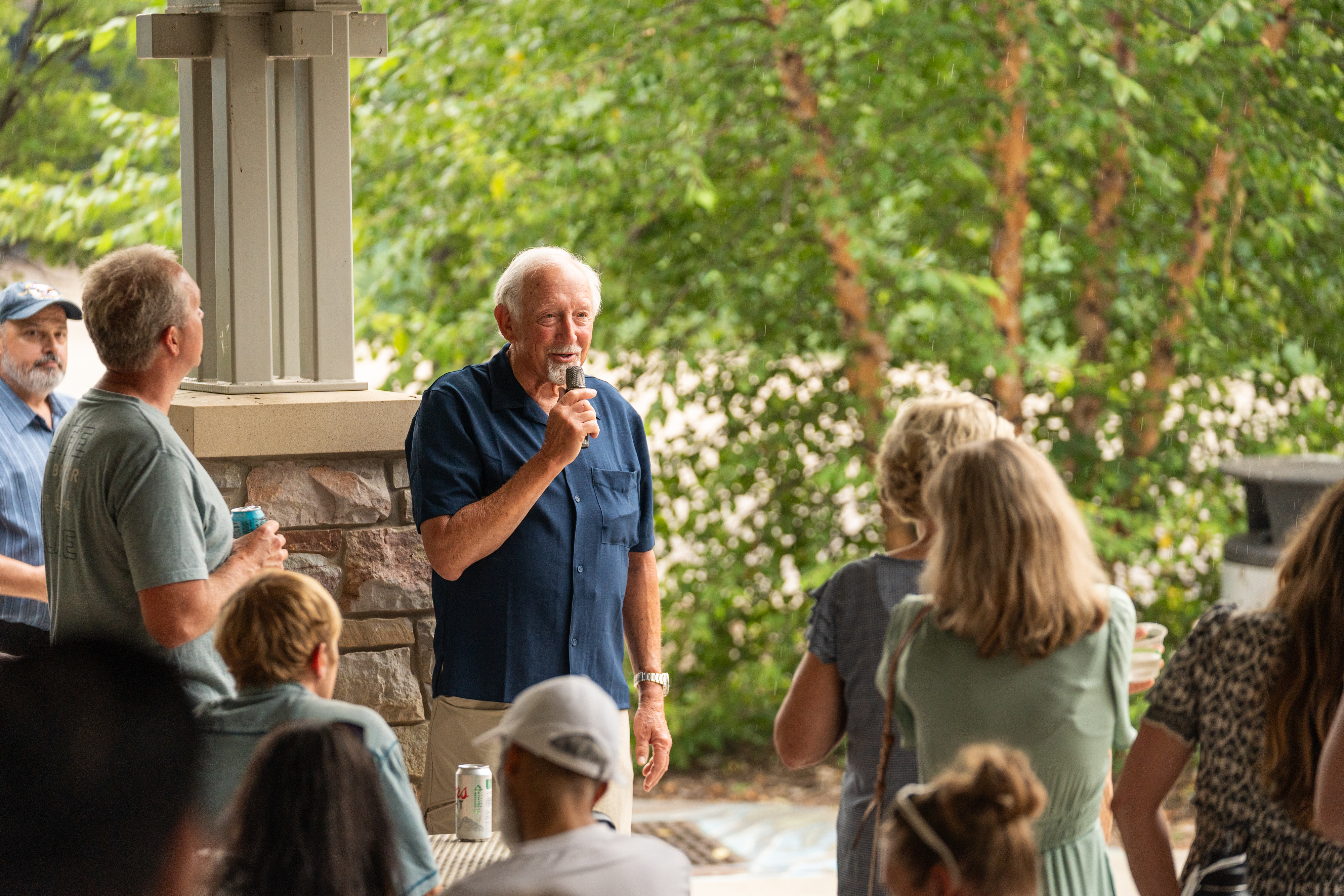 Urban Land Interests leadership speaking to employees and their families during the annual company picnic at Henry Vilas Zoo