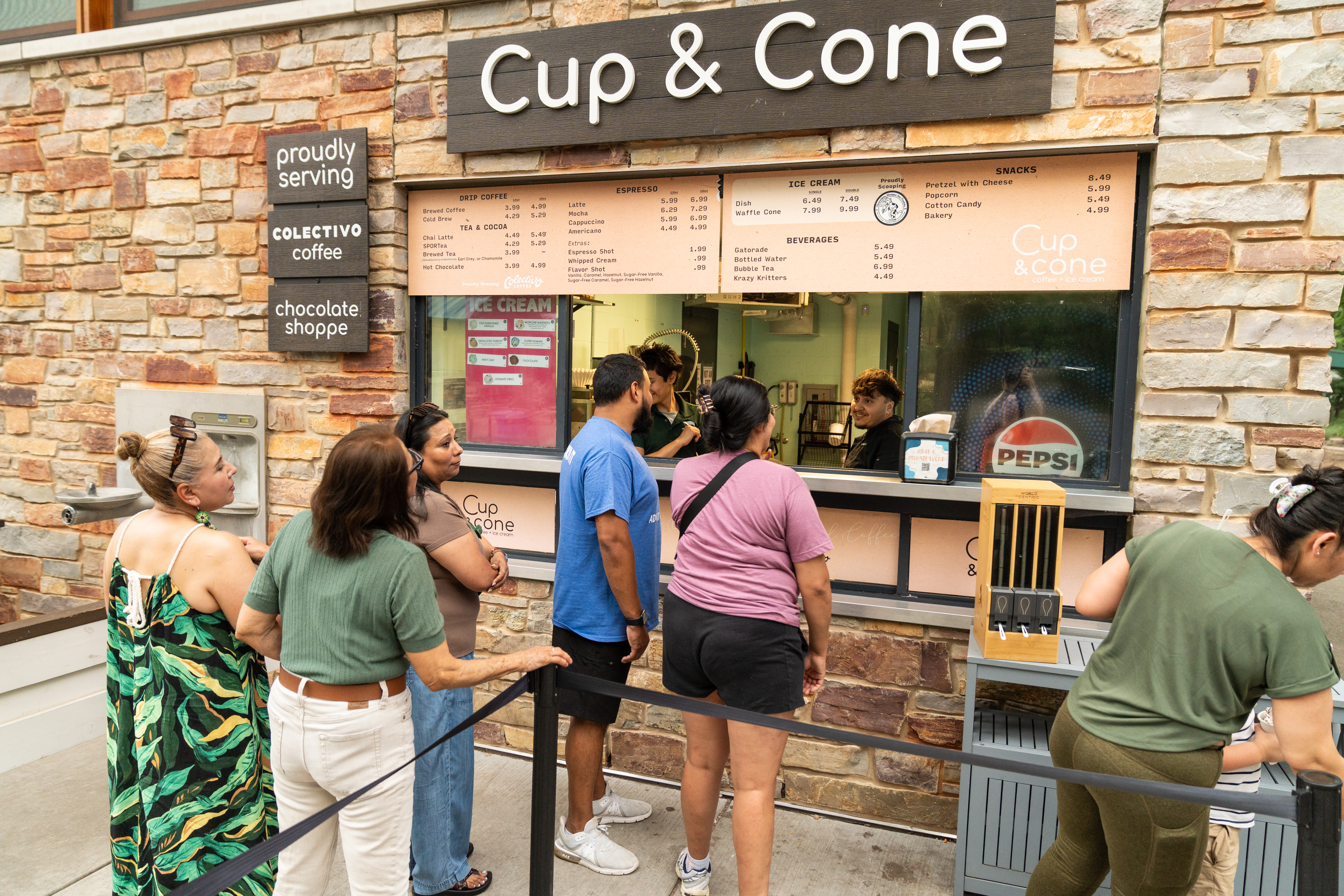 10.	Employees and their families gathering outside the Cup and Cone stand at Henry Vilas Zoo