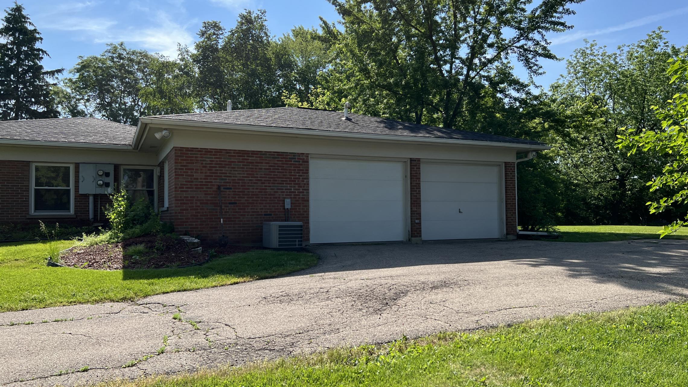 401 Holtzman - Duplex - Two - Bedroom - Two Bathroom - Den - Sunroom - Garage - Yard - Patio