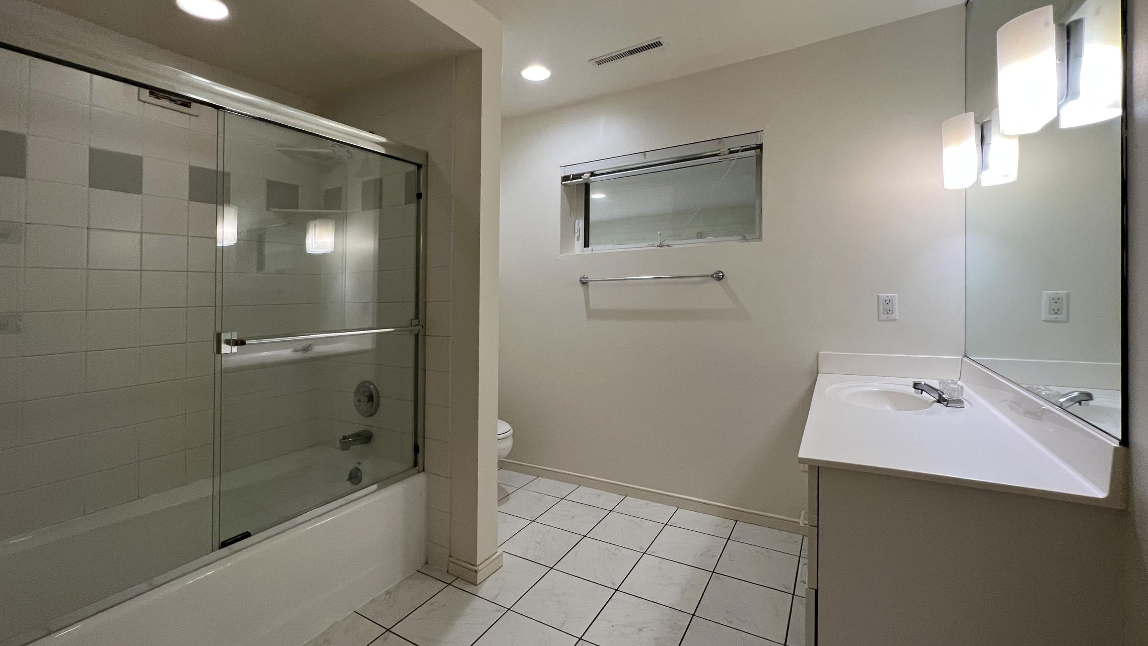 401 Holtzman - Duplex - Two - Bedroom - Two Bathroom - Den - Sunroom - Garage - Yard - Patio