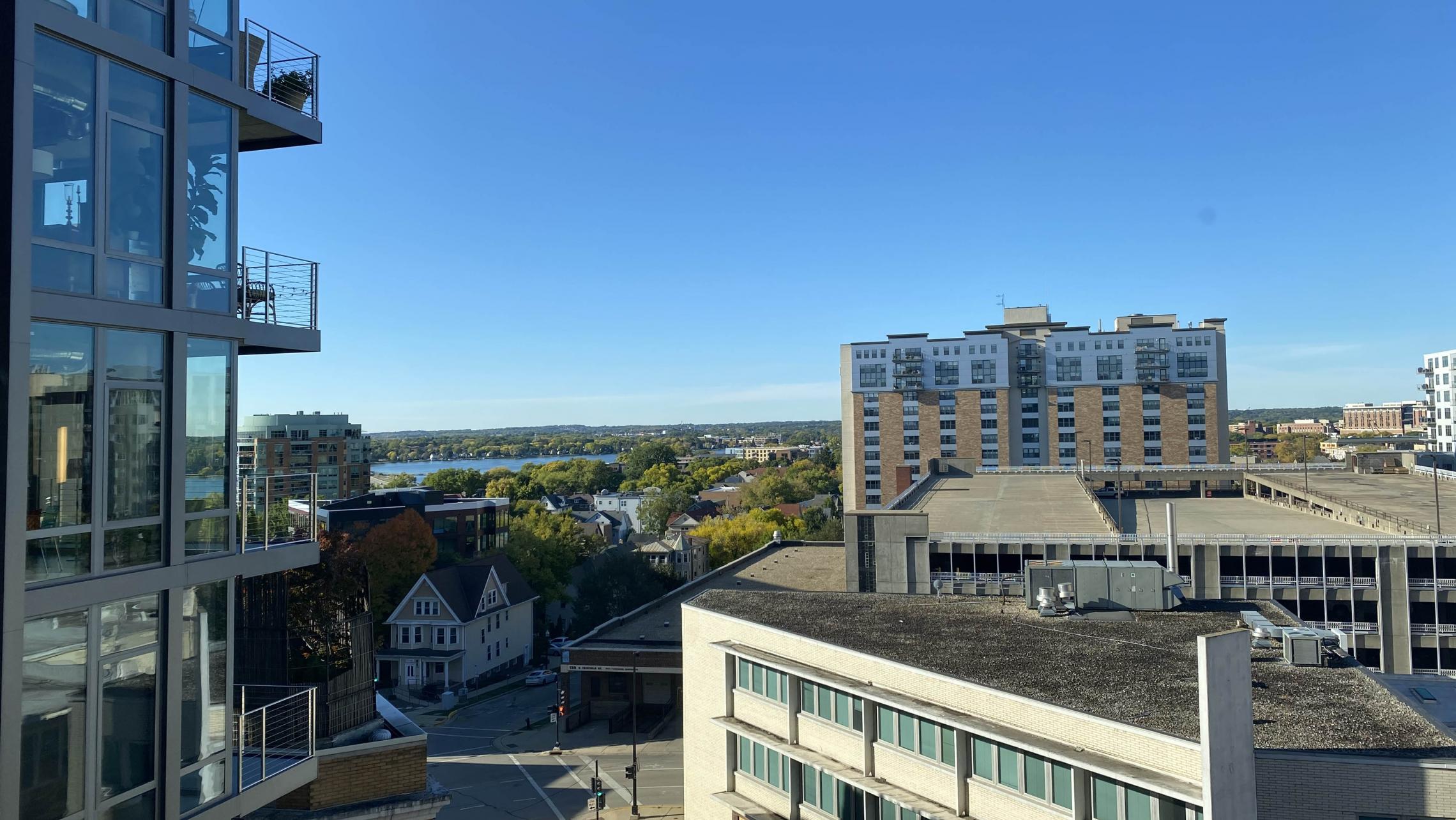 The-Pressman-Apartment-602-Two-Bedroom-Two-Bath-Kitchen-Living-Upscale-Luxurious-Modern-Exposed-Duct-Concrete-Capitol-Square-Downtown-Views-Madison-Balcony-Terrace-Pets-Fitness-Lounge-Grill-Lifestyle