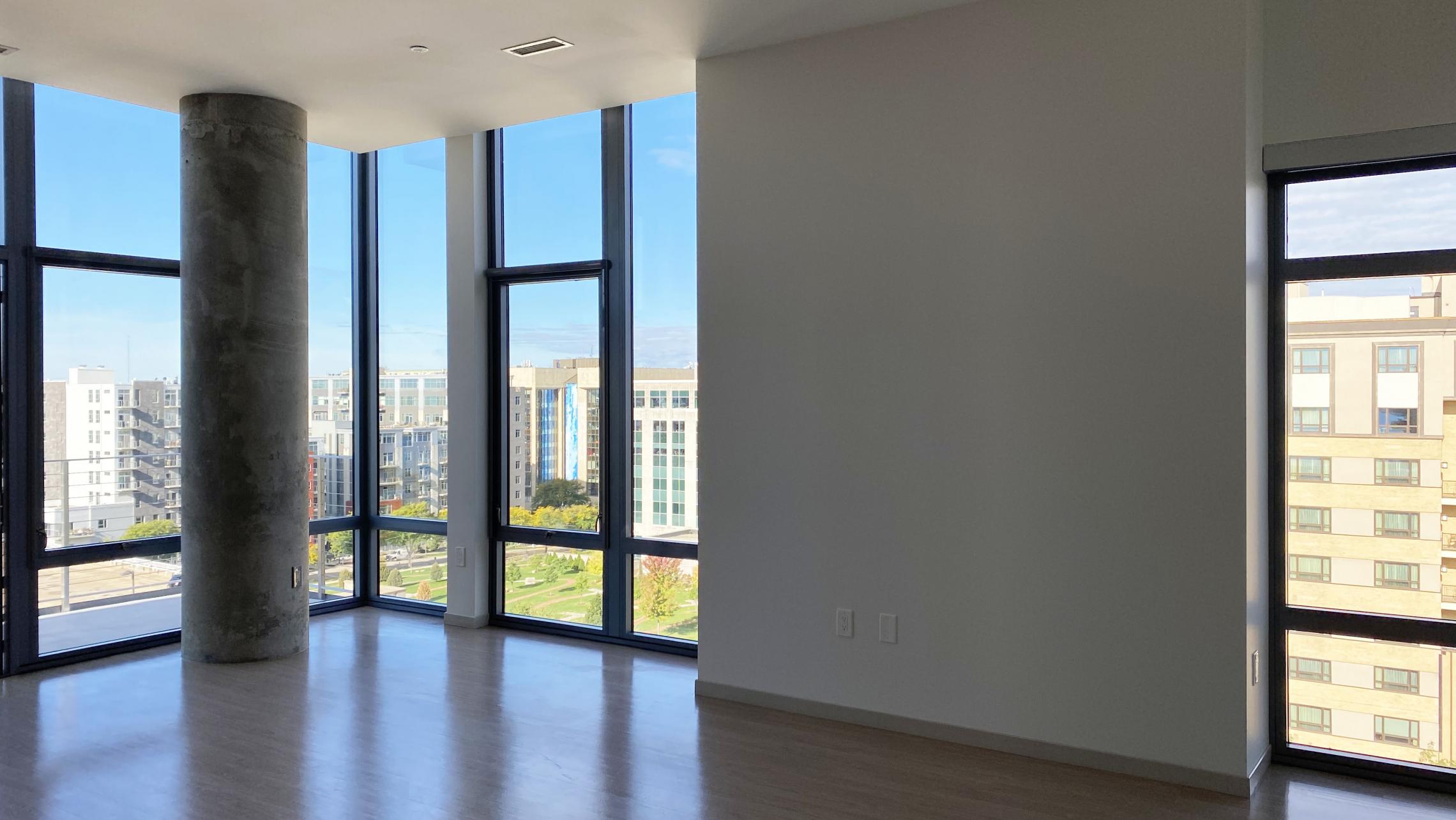 The-Pressman-Apartments-Two-Bedroom-912-Modern-Upscale-Luxury-Top-Floor-Capitol-Lake-View-Balcony-Corner-Lifestyle-Downtown-Madison-Design-Concrete-Kithcen-Living-Dining-Windows-Dogs-Cats-Pets-Fitness-Lounge