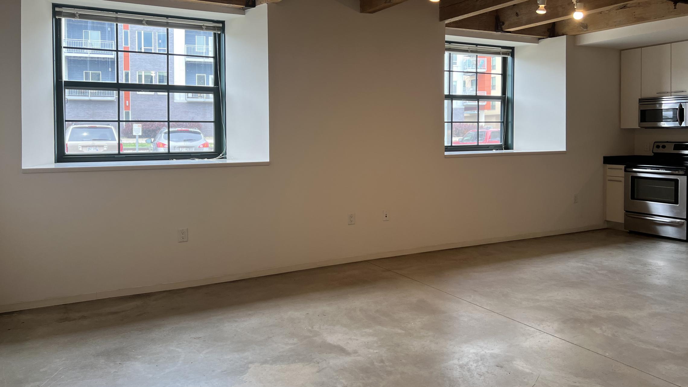 Tobacco-Lofts-at-The-Yards-Apartment-E107-Studio-Historic-Design-Exposed-Brick-Concrete-Floors-Downtown-Madison-Fitness-Lounge-Courtyard-Views-Cat-Upscale-Modern-Home