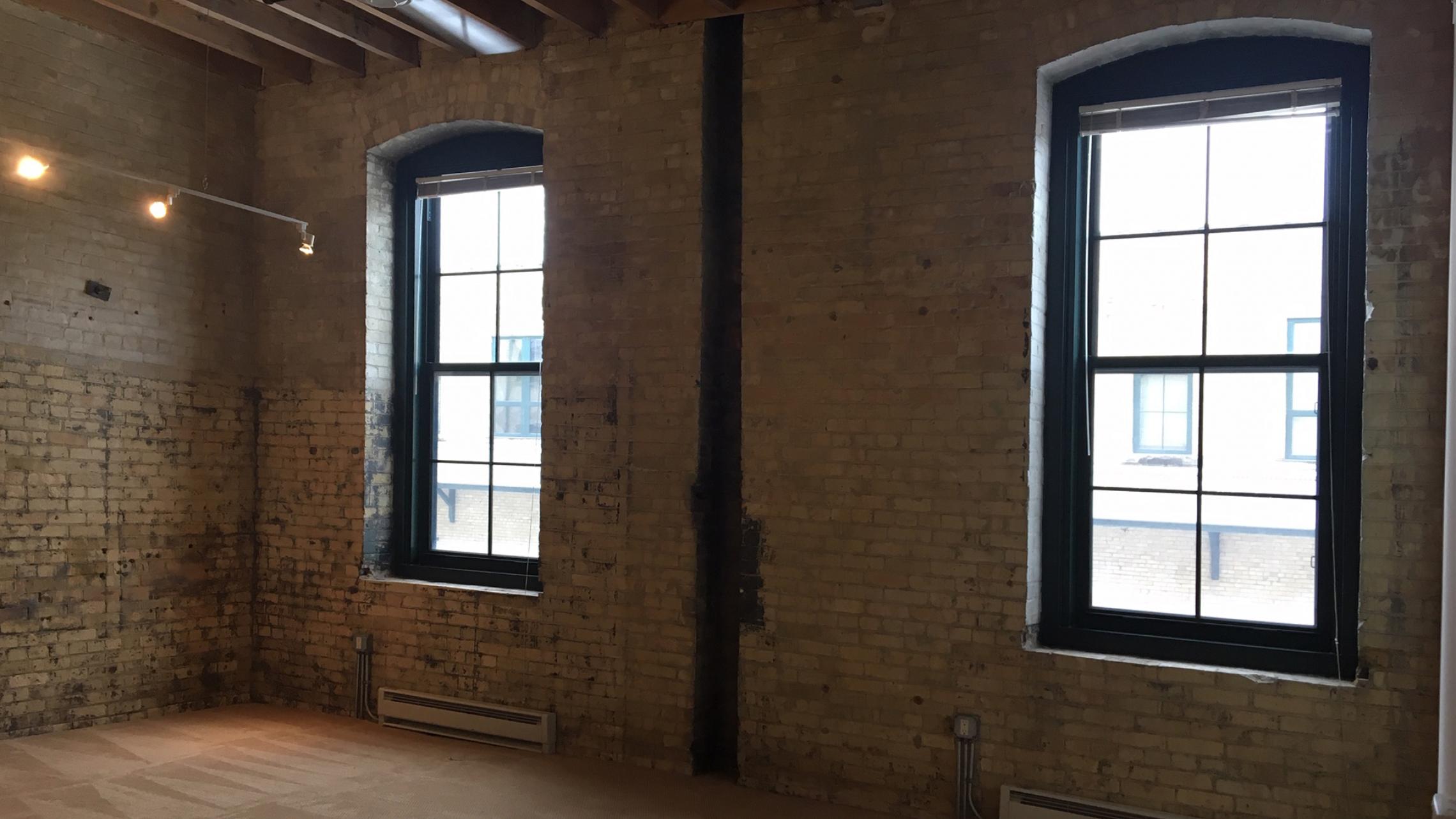 Tobacco-Lofts-At-The-Yards-Apartment-E208-One-Bedroom-Historic-Exposed-Brick-Timber-Unique-Downtown-Madison-Bike-Path-Fitness-Lounge-Courtyard