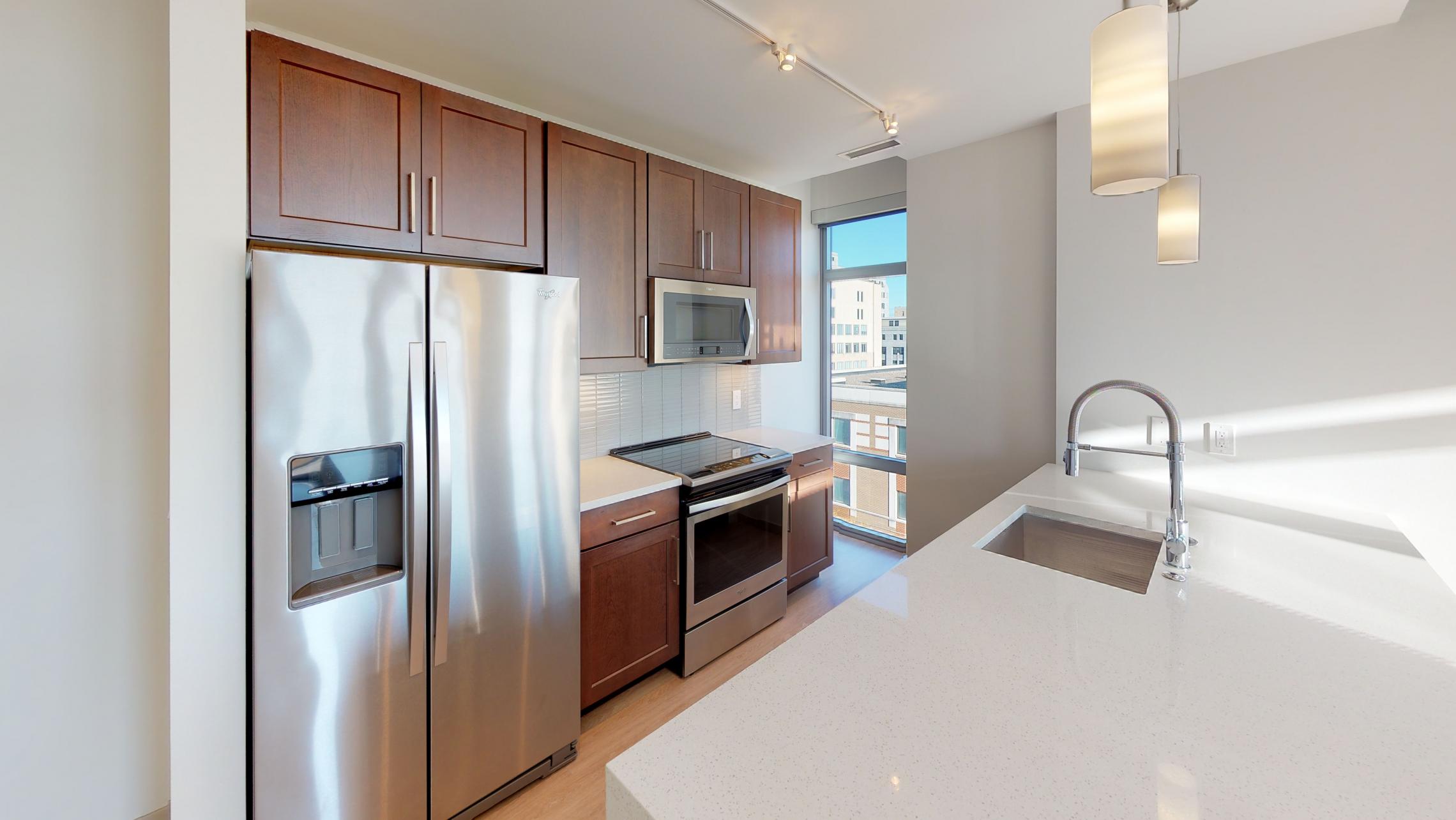 The-Pressman-513-One-Bedroom-Corner-Balcony-View-Madison-Downtown-Luxury-Upscale-Modern-Lake-Capitol-Kitchen-Dining.jpg
