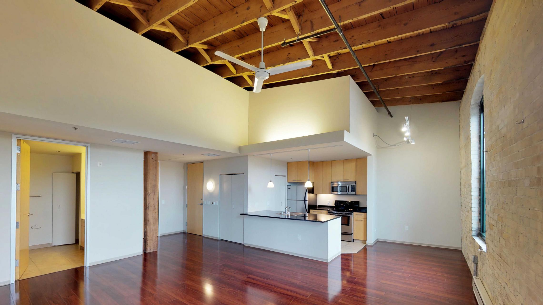 Tobacco-Lofts-Two-Bedroom-Apartment-E312-Historic-Downtown-Madison-Living-Room-Kitchen-Design-Yards