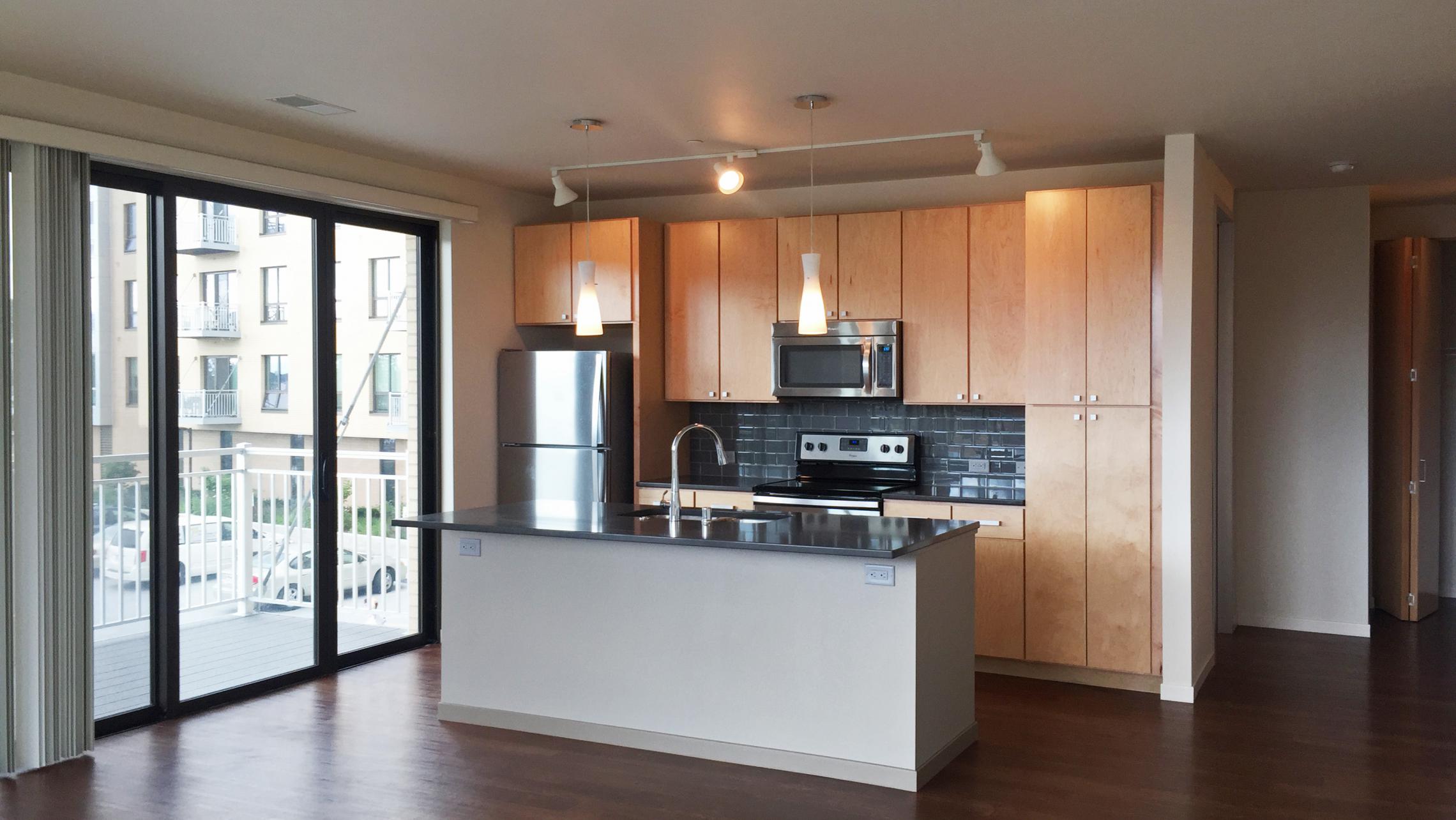 ULI Nine Line Apartment 505 - Kitchen and Balcony