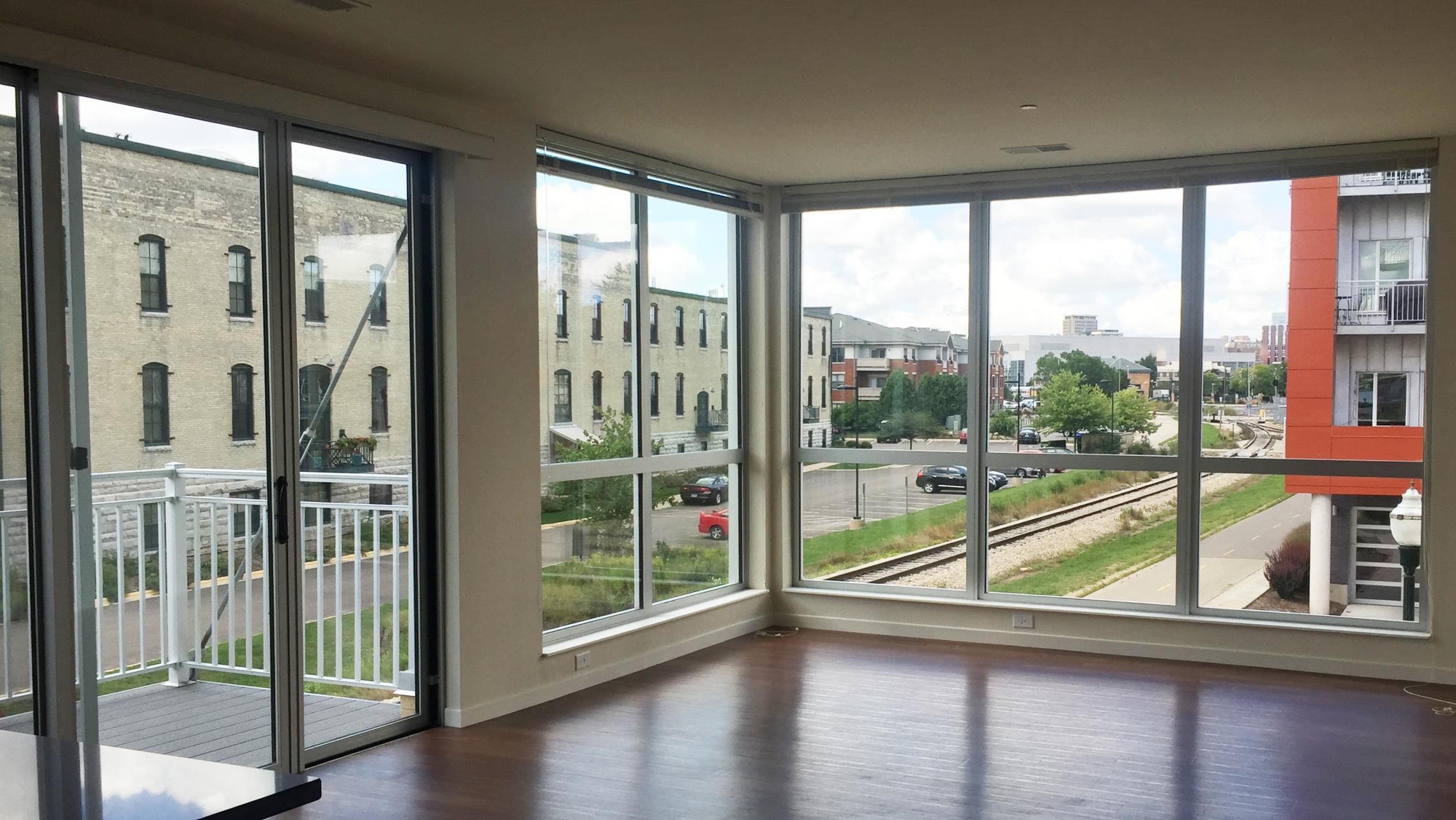 ULI Nine Line Apartment 514 - Living Room with view of Tobacco Lofts