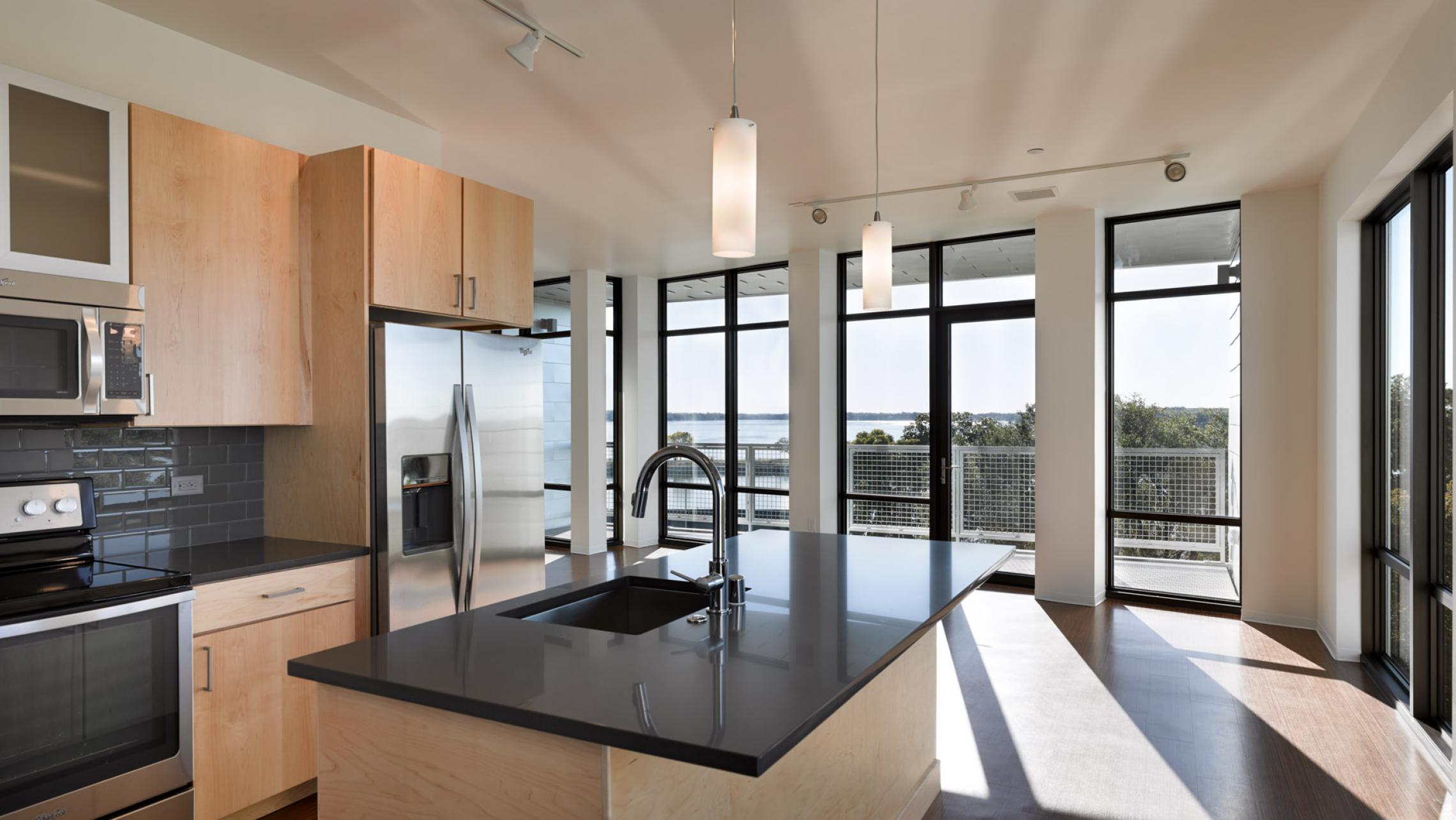 ULI Seven27 Apartments - Kitchen with a lake view and natural light