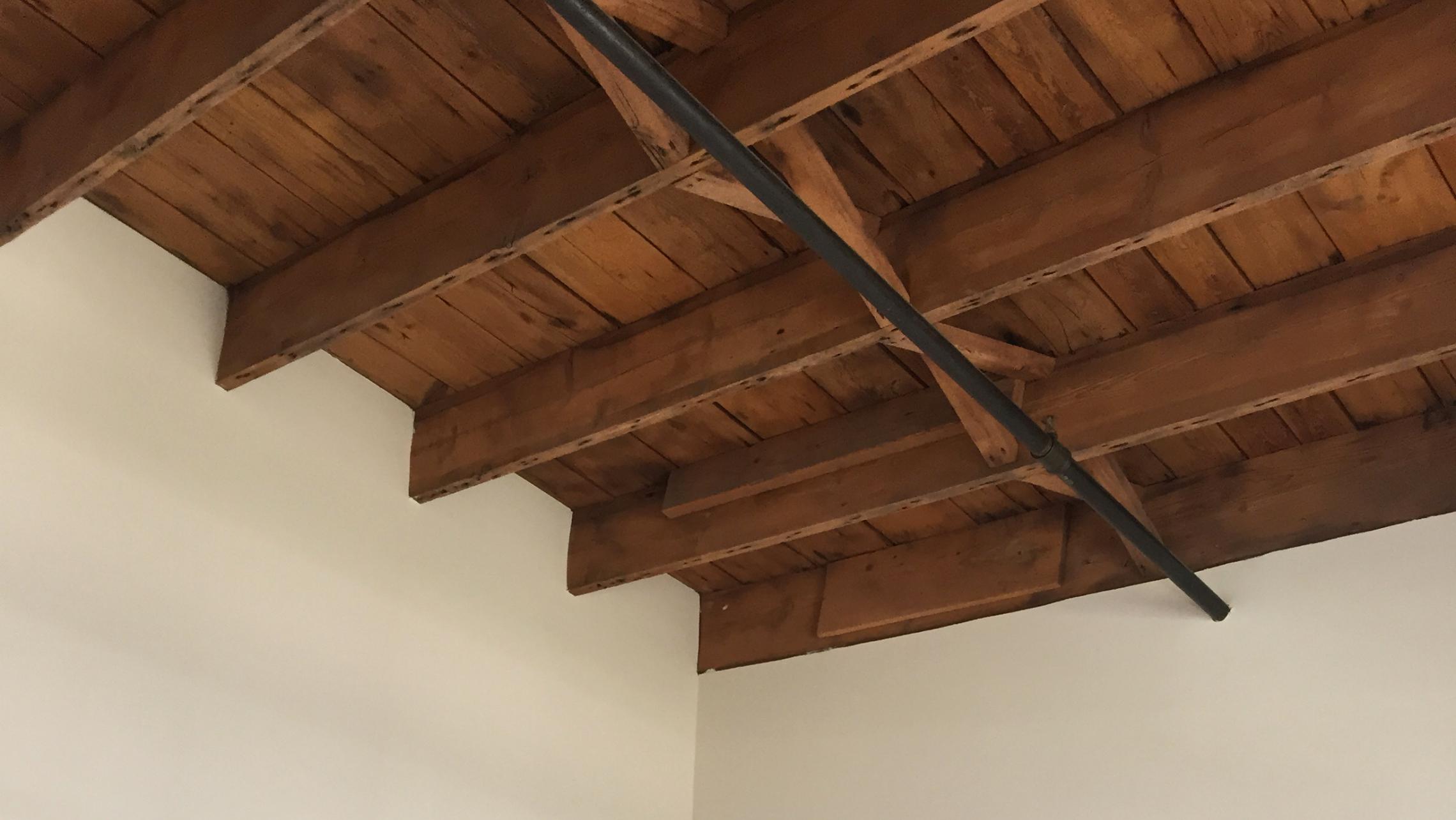 ULI Tobacco Lofts - E309 - Ceiling with Exposed Wood Beams