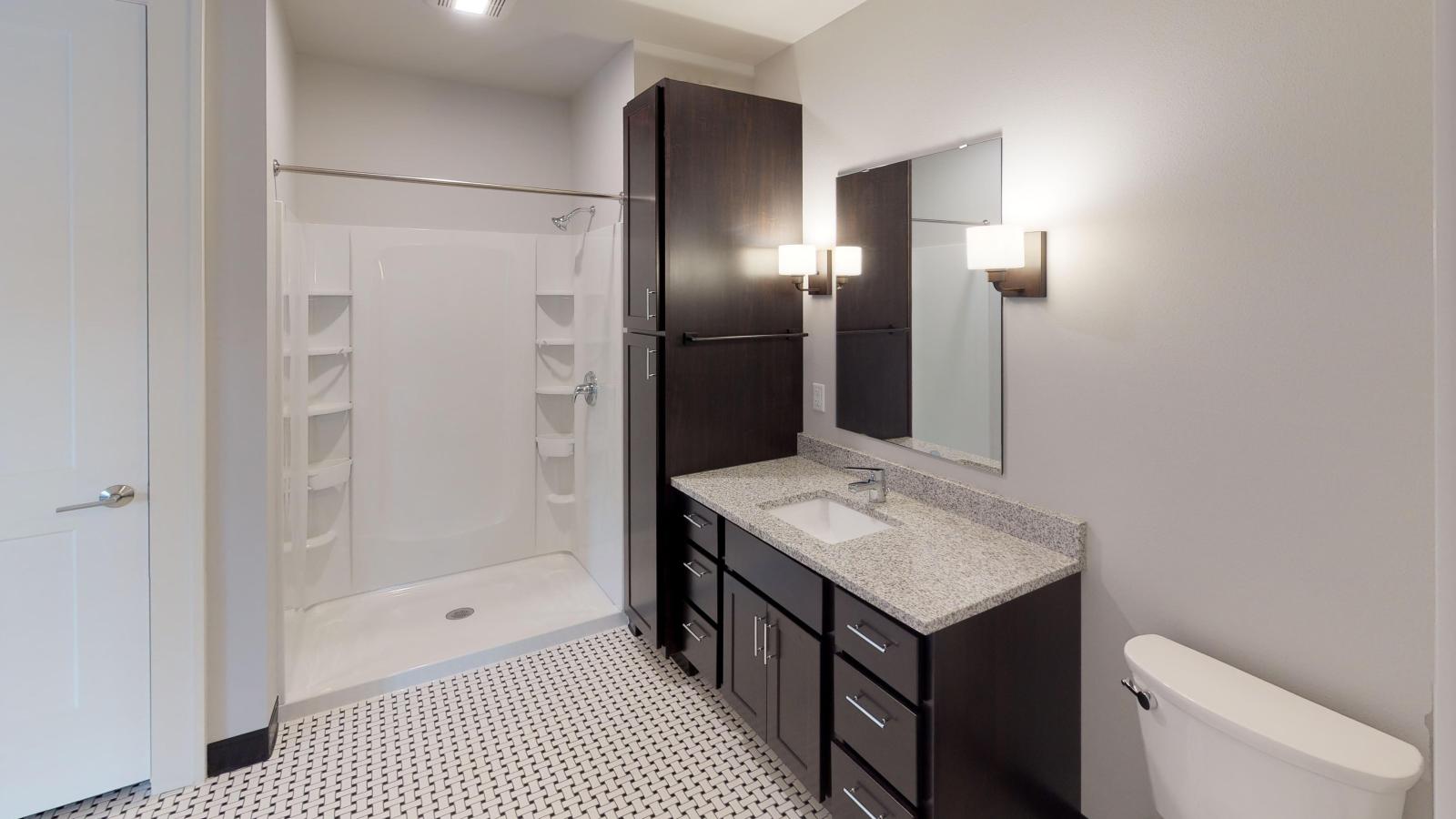 Cozy one-bedroom apartment at 1722 Monroe Apartments in Madison with ample closet space and classic tile bathrooms.