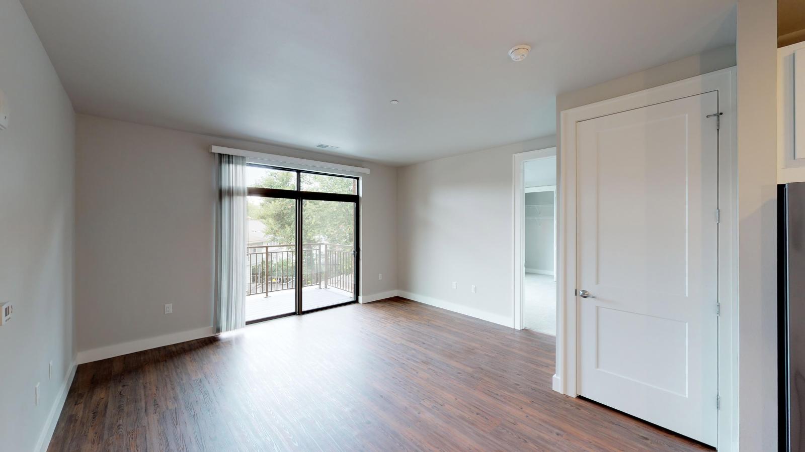 The Pressman two-bedroom apartment in Madison with an open living area and sleek finishes and private balcony.