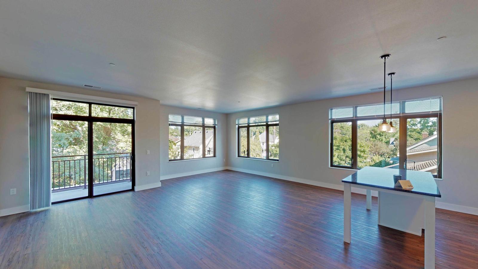 Elegant corner three bedroom at 1722 Monroe Apartments in Madison with balcony and neighborhood views