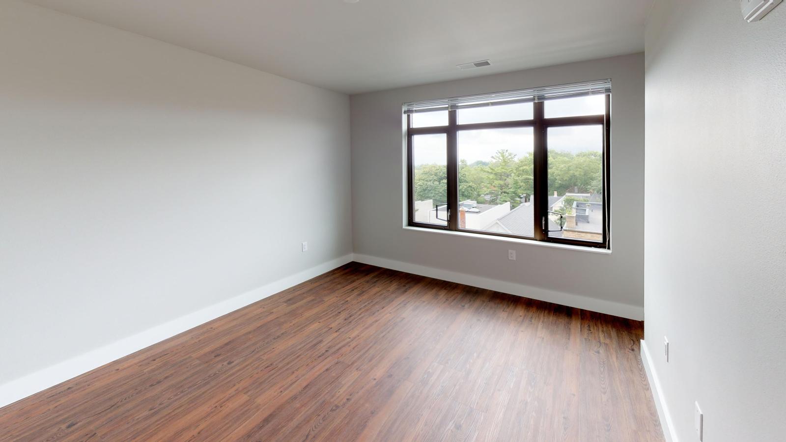 Bright and modern one-bedroom apartment at 1722 Monroe Apartments in Madison with large closet and classic finishes.