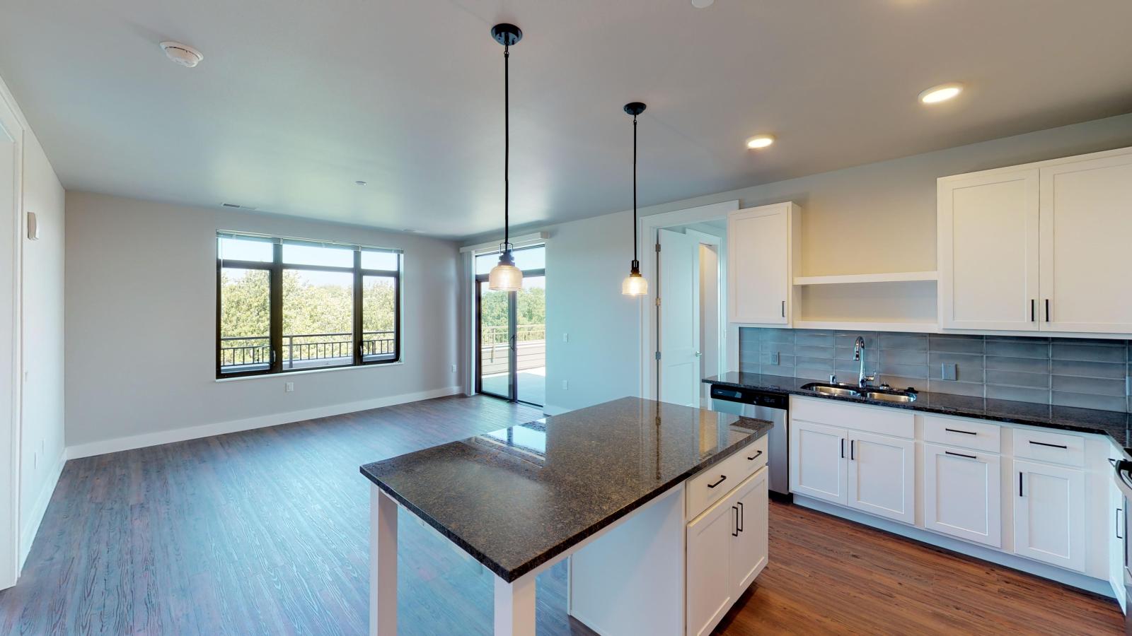 Modern two-bedroom apartment at 1722 Monroe Apartments in Madison with a spacious layout and high-end finishes.