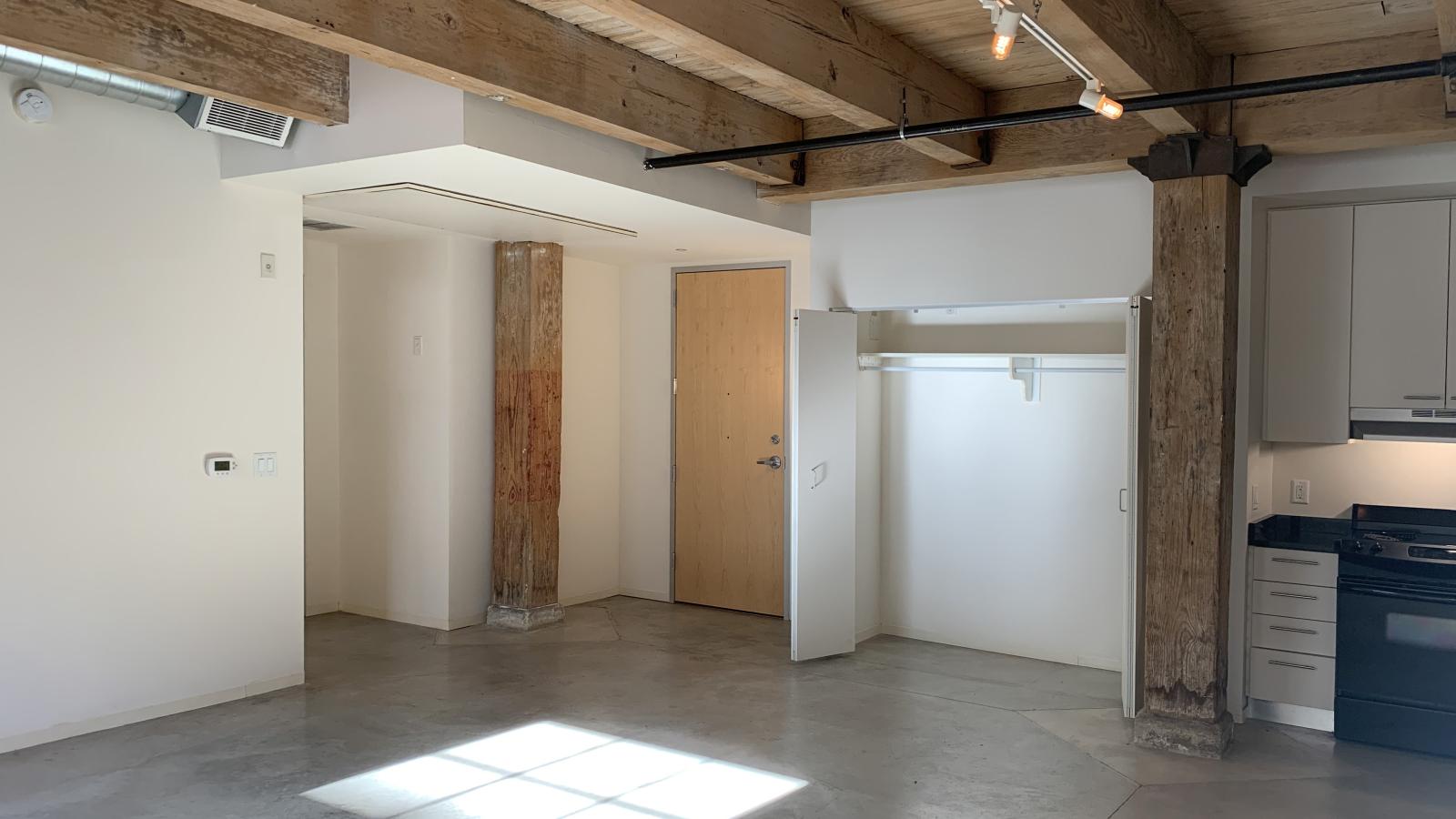 Garden level one bedroom apartment with polished concrete floors at Tobacco Lofts