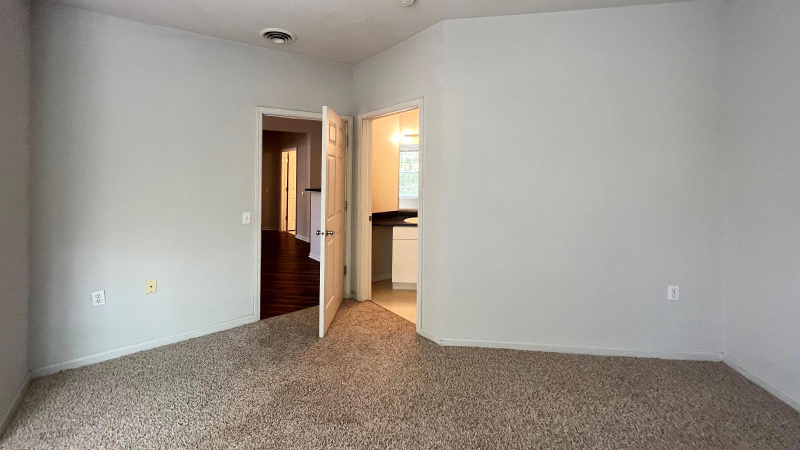Classic bathroom with traditional fixtures and ample space at Wilson Bay
