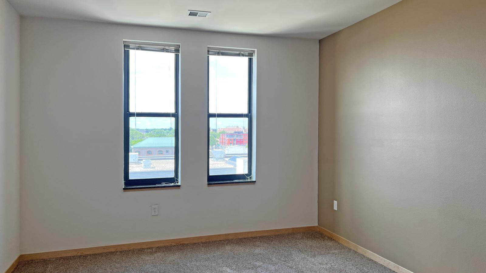 One bedroom apartment with warm finishes and ample space at The Depot in downtown Madison