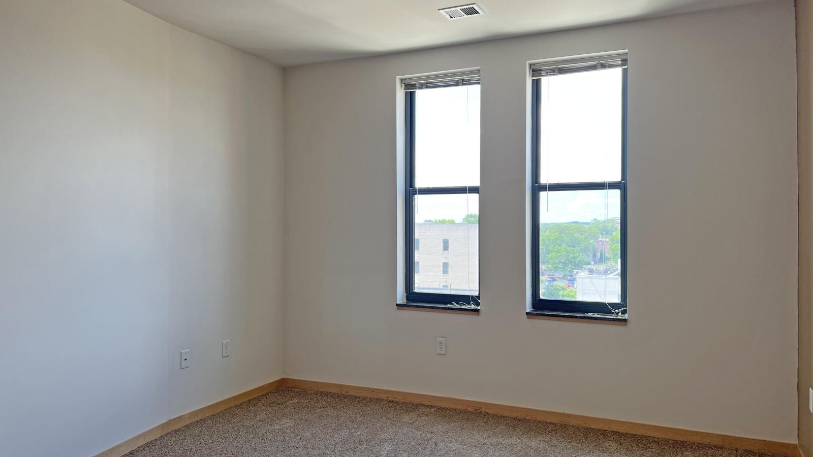 One bedroom apartment with warm finishes and ample space at The Depot in downtown Madison