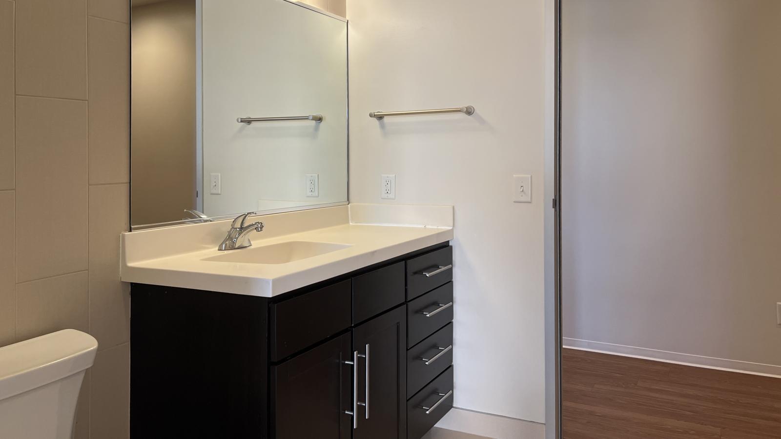 Bathroom with in-floor radiant heat and standing shower at Capitol Hill
