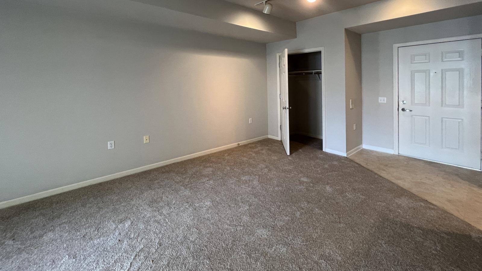 Cozy living room with soft finishes and dinning space at Wilson Bay