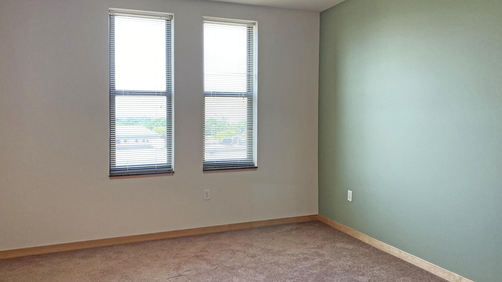 One bedroom with stunning natural light at The Depot downtown Madison