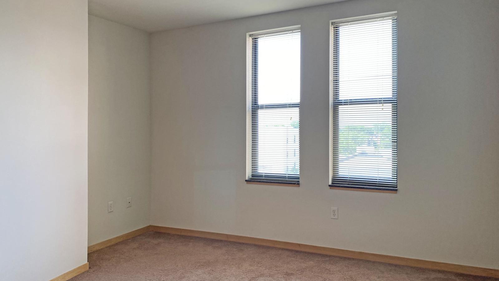 One bedroom with stunning natural light at The Depot downtown Madison
