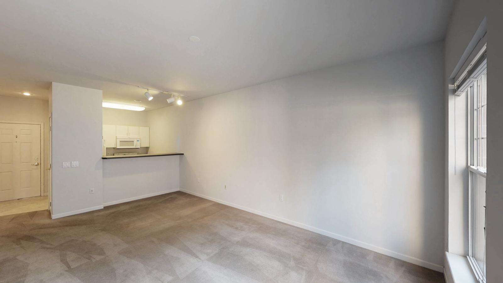 Kitchen with standard appliances and cabinetry at City Place Apartments