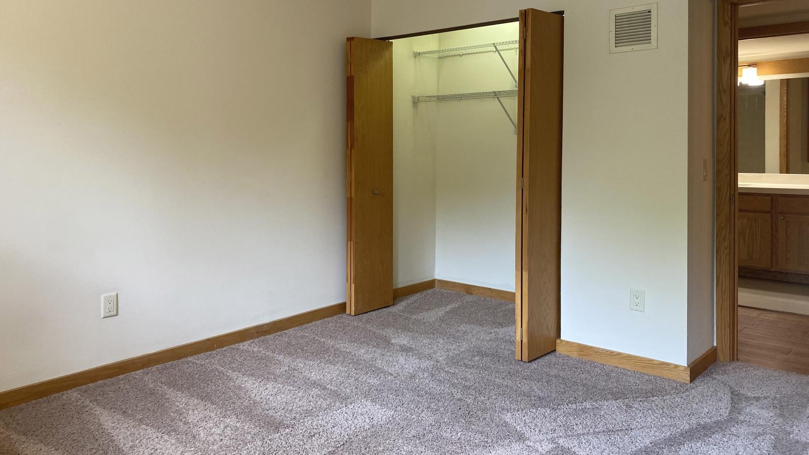 Bright bedroom with natural light at Lincoln School
