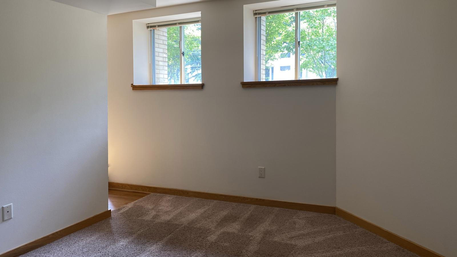 Bright bedroom with natural light at Lincoln School