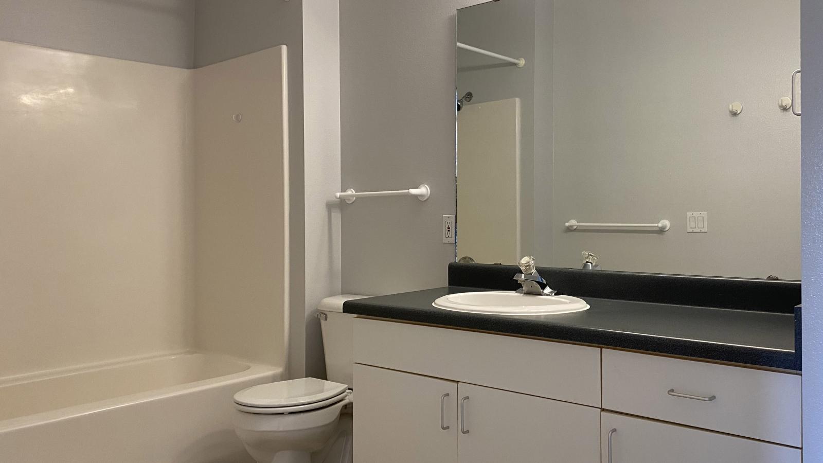 Classic bathroom with traditional fixtures at City Place Apartments