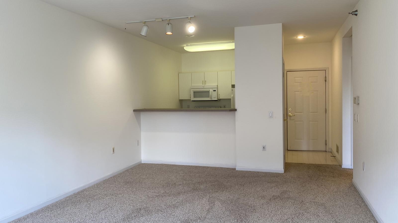 Kitchen with standard appliances and cabinetry at City Place Apartments