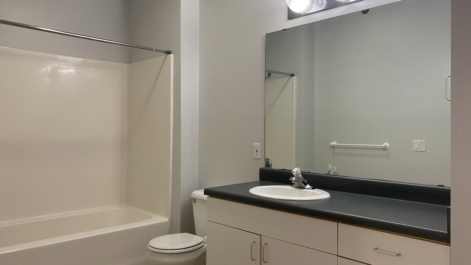 Classic bathroom with traditional fixtures at City Place Apartments