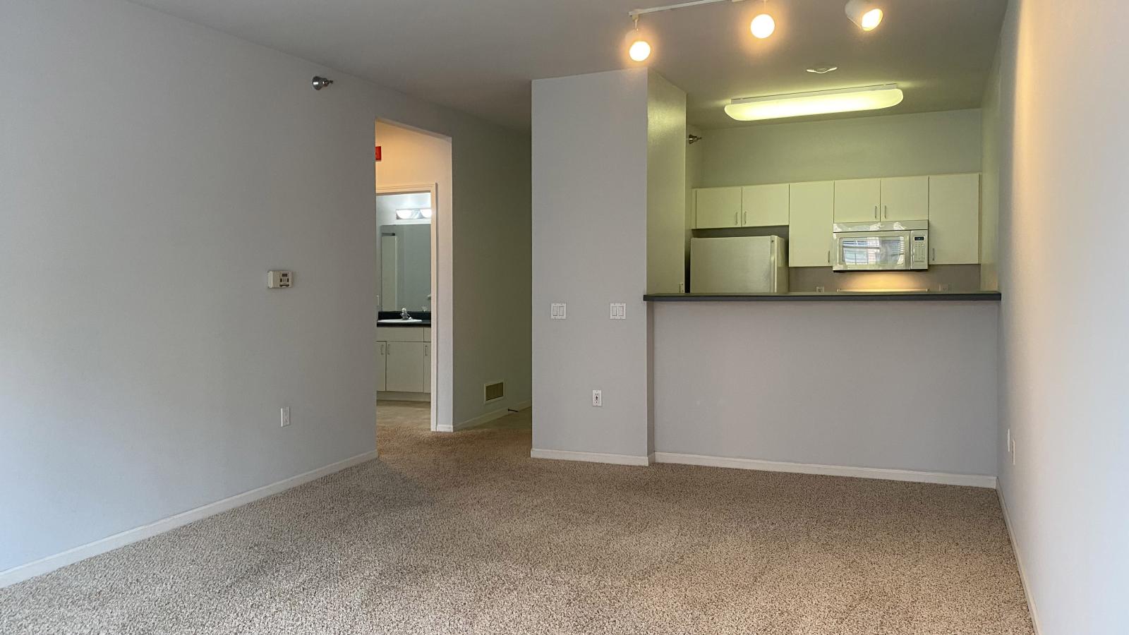 Kitchen with standard appliances and cabinetry at City Place Apartments