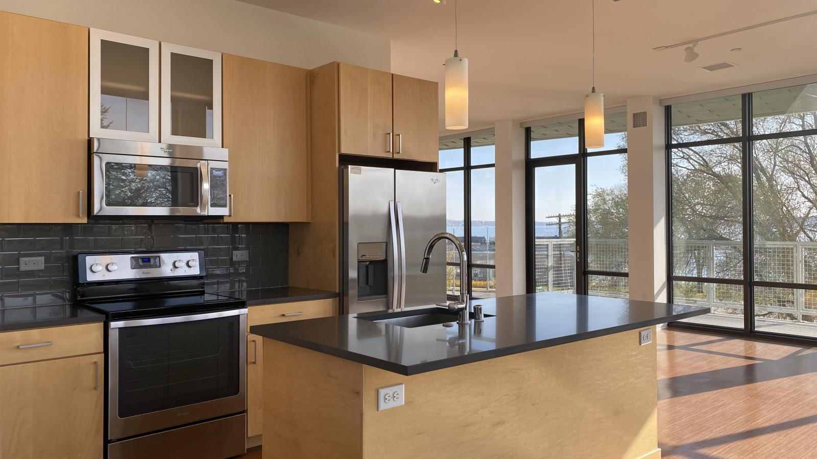 Two bedroom apartment kitchen featuring ample counter space and luxury finishes at SEVEN27