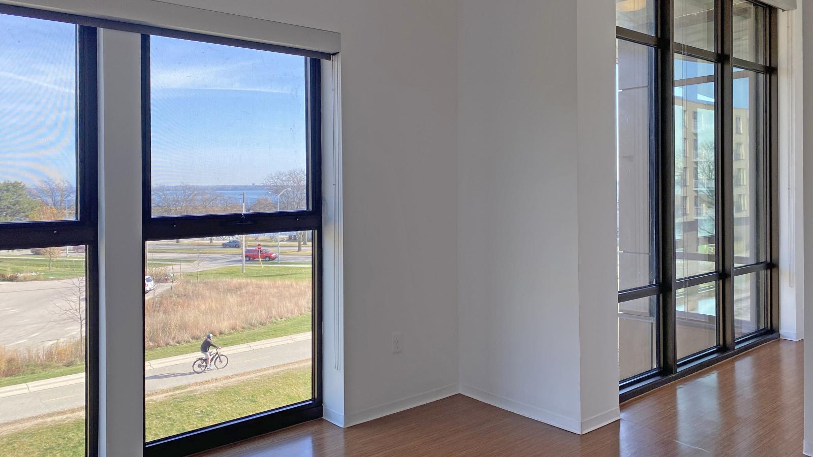 Spacious two bedroom with walk in closets, lake view, and contemporary finishes at SEVEN27