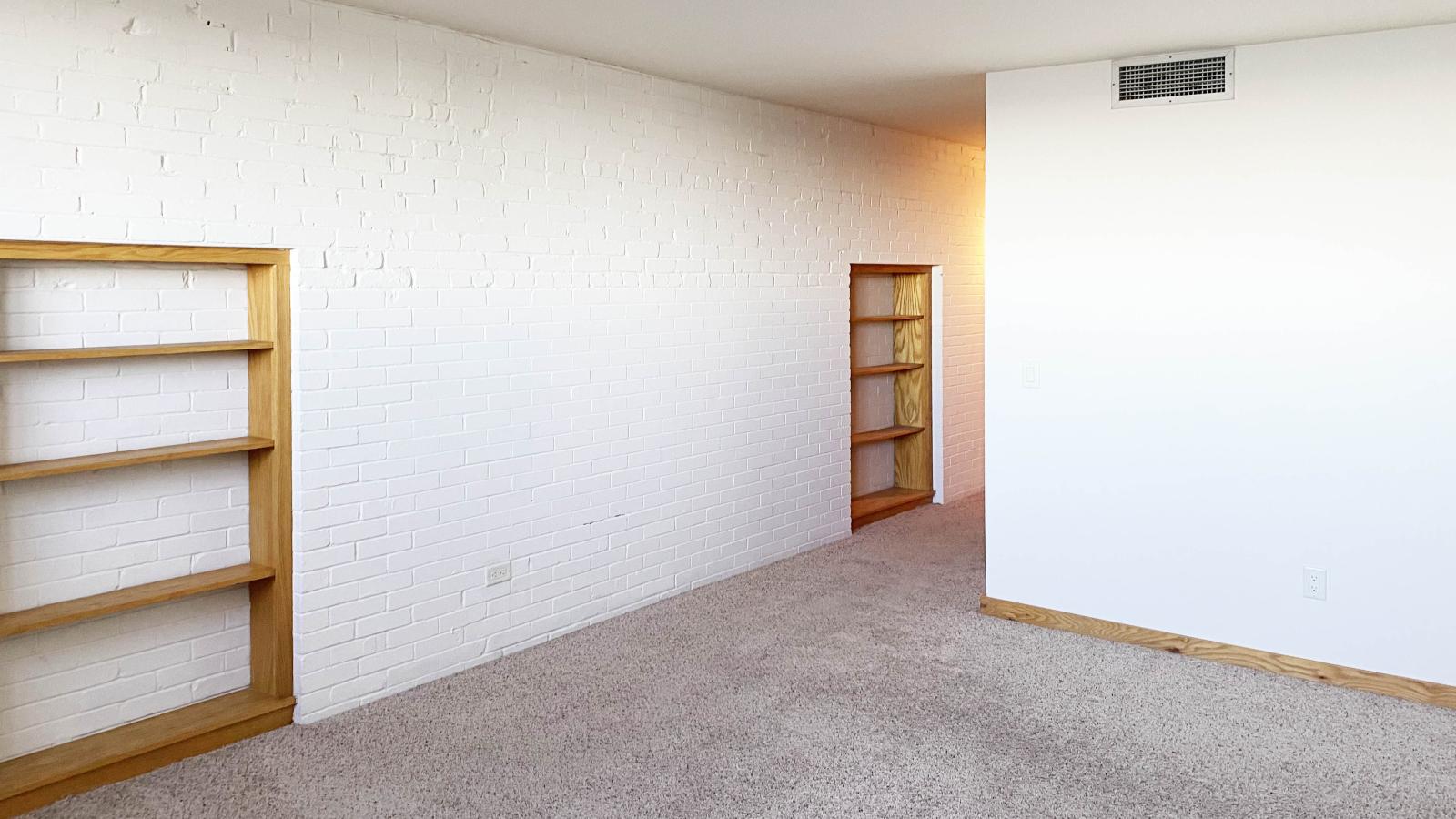 Bright bedroom with natural light at Lincoln School
