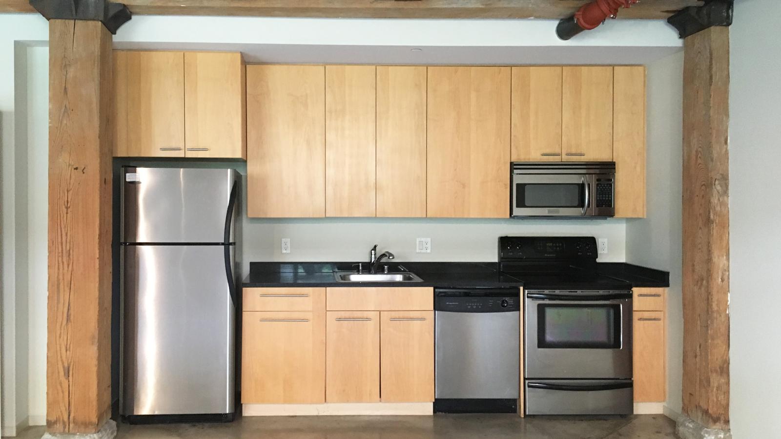 One bedroom apartment with stainless steel appliances at Tobacco Lofts