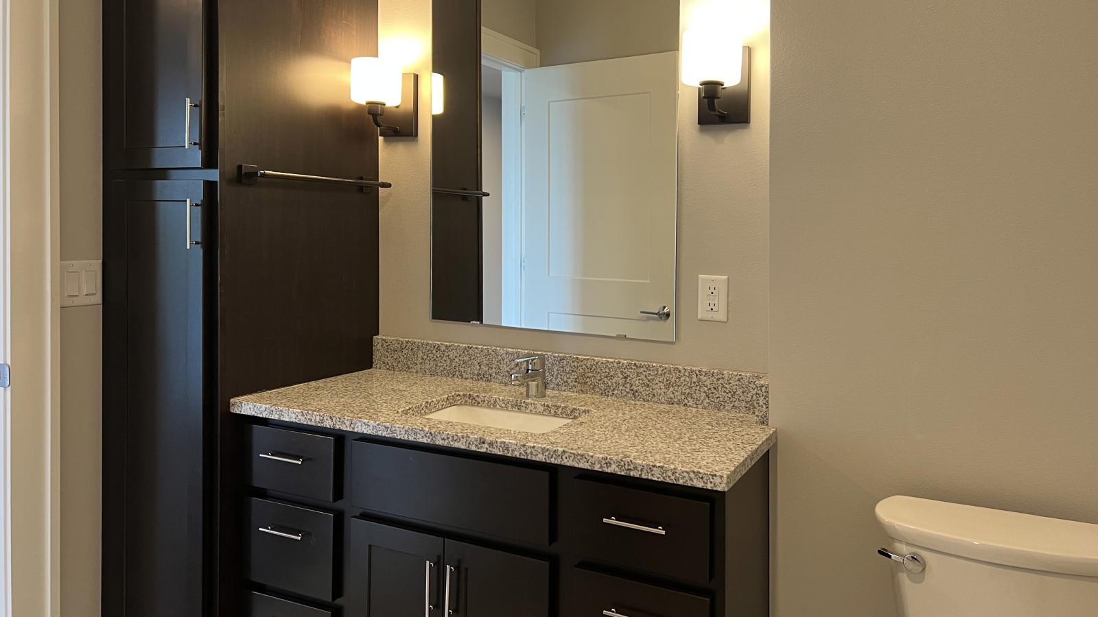 Elegant apartment at 1722 Monroe Apartments in Madison with classic tile bathrooms and soft finishes.