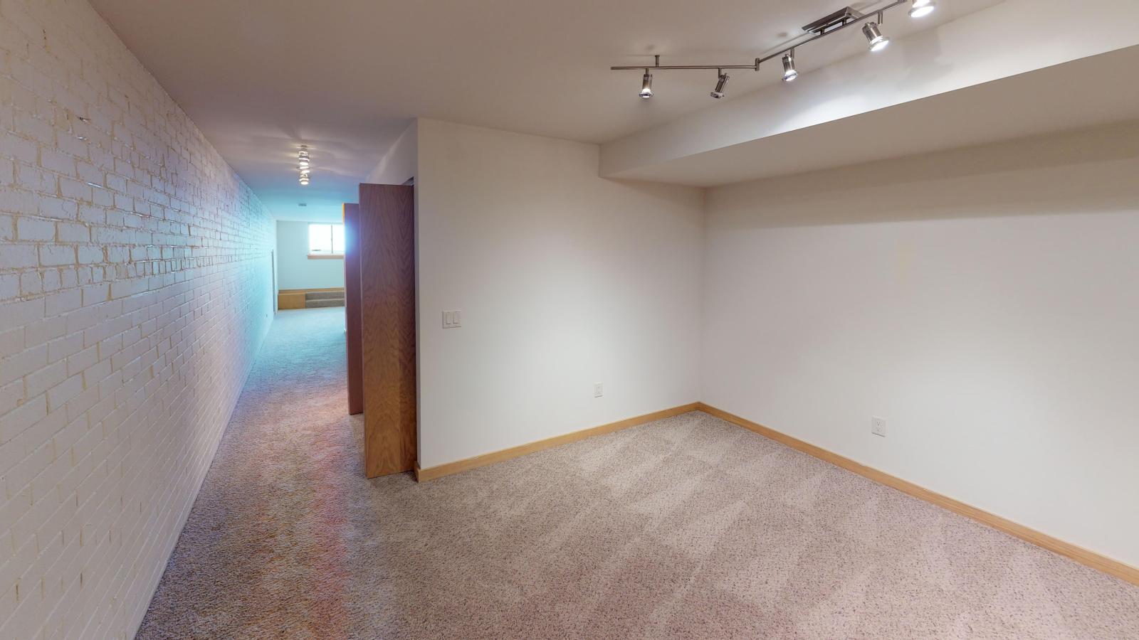 Spacious den in one bedroom den at Lincoln Scool Apartments