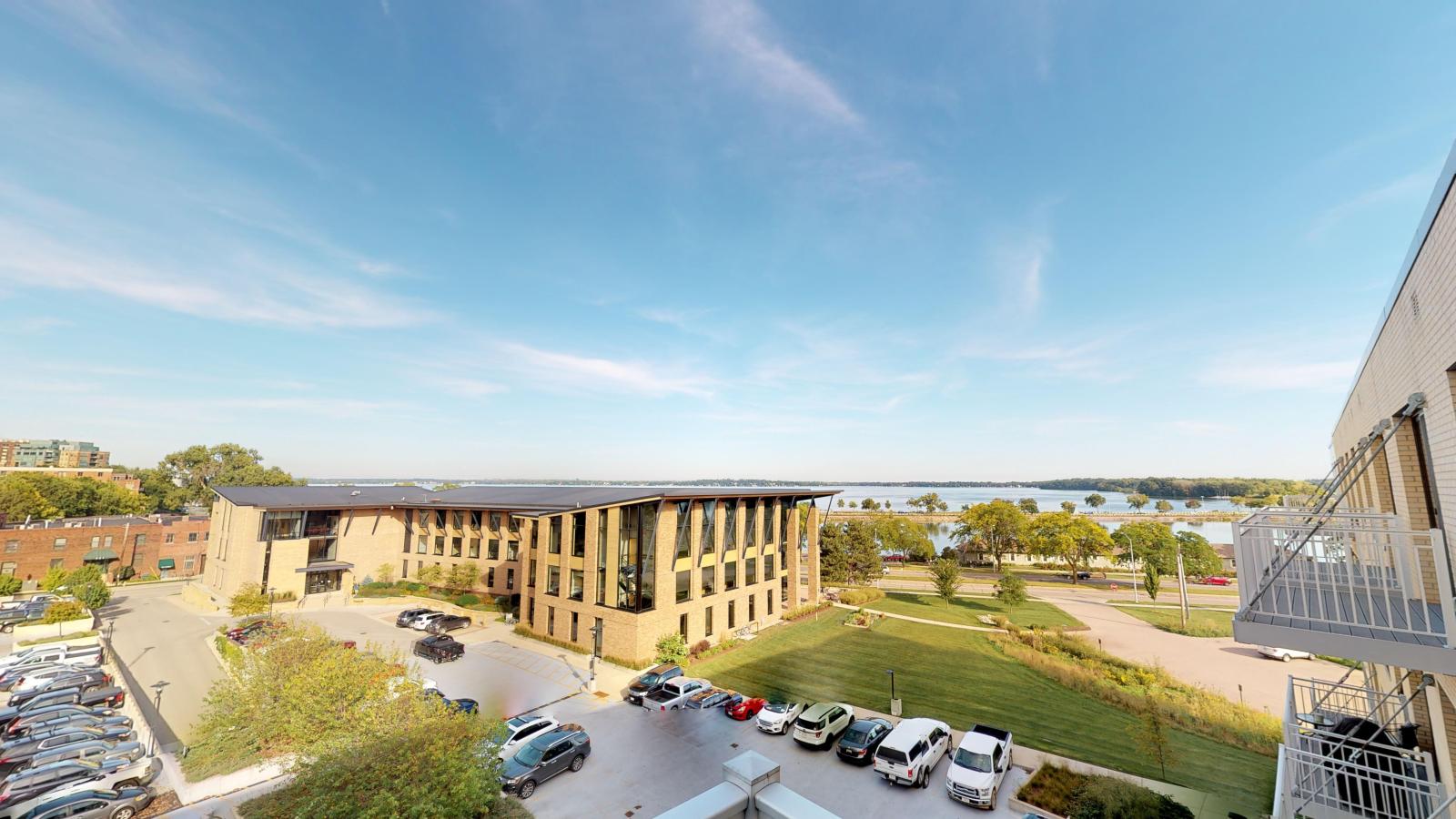 One bedroom apartment with scenic lake views from balcony at Nine Line Apartments in Madison