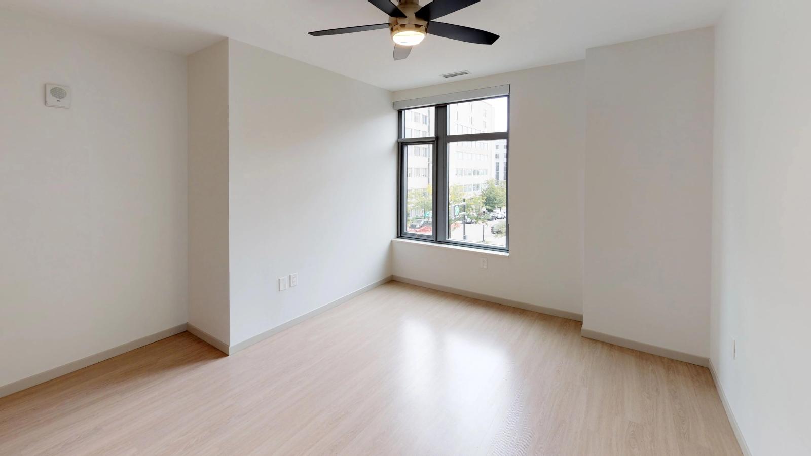 Open-layout two-bedroom apartment at The Pressman in downtown Madison with ample natural light and a contemporary design.